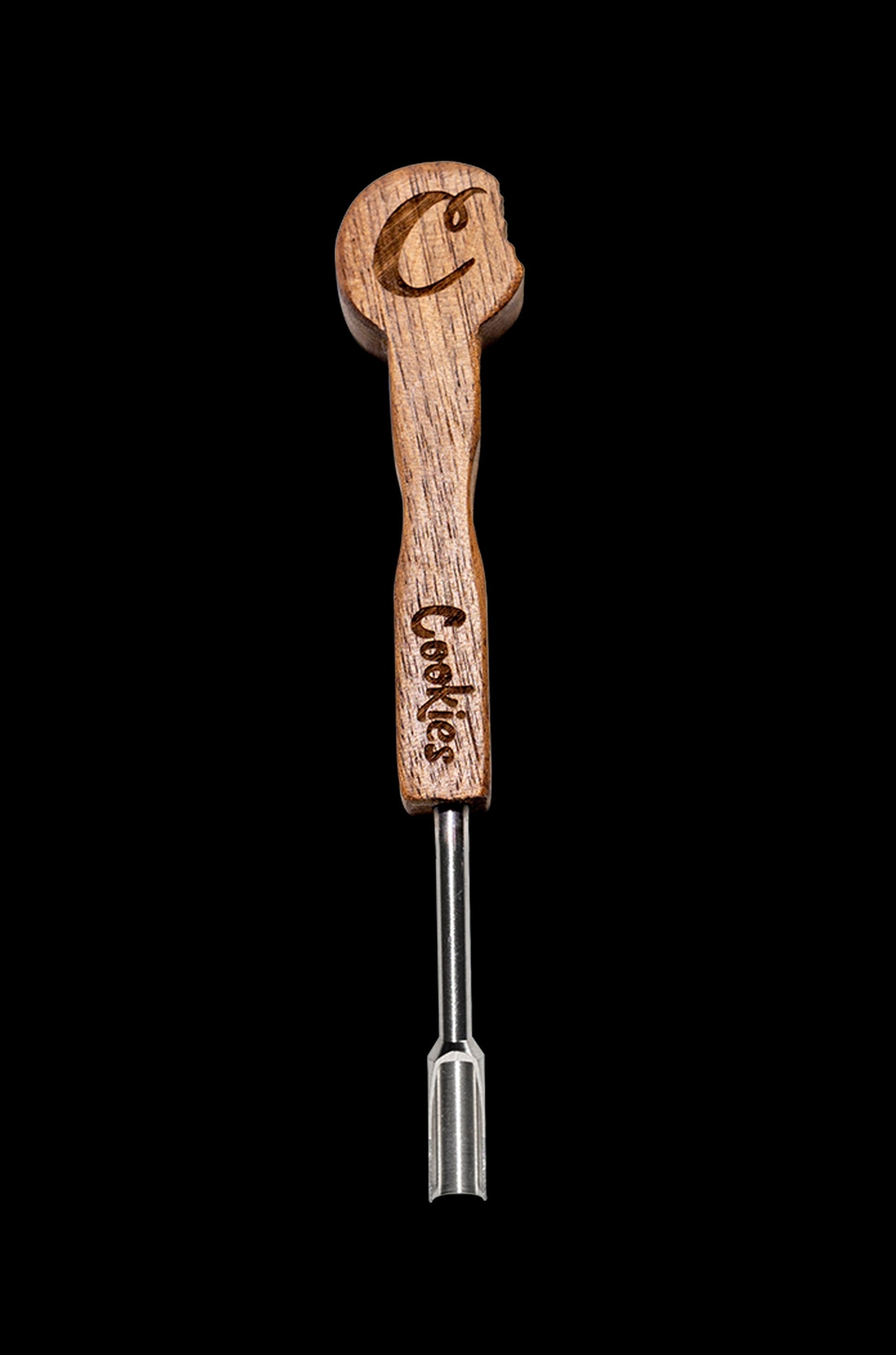 Wooden cannabis dab tool with metal tip and “Cookies” branding on a black background.