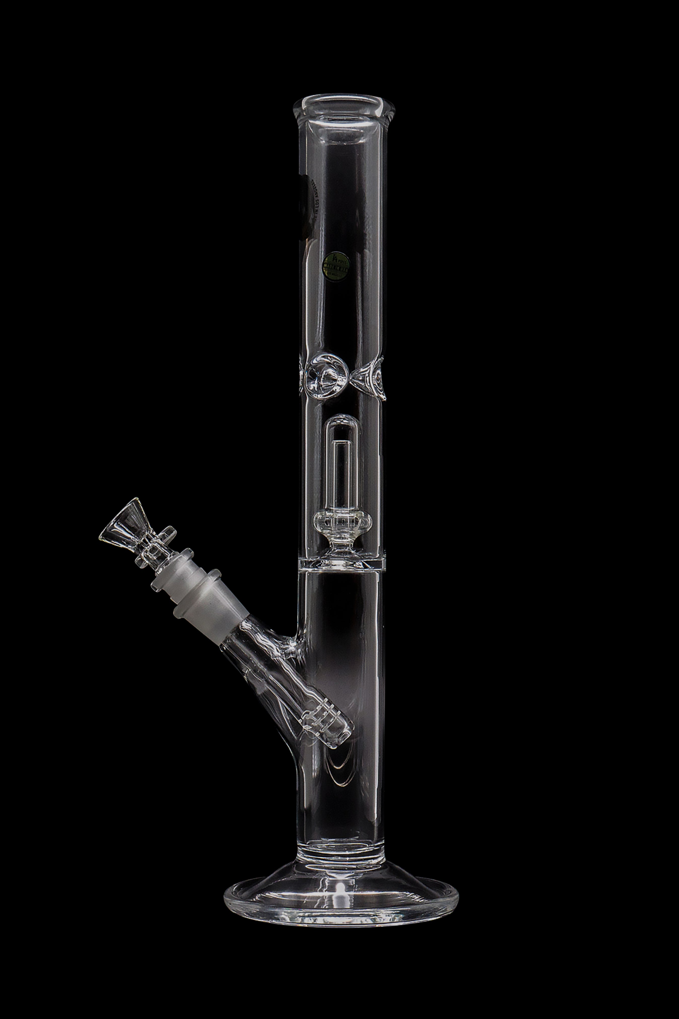 Clear glass water pipe (bong) with ice catcher and downstem, isolated on black.