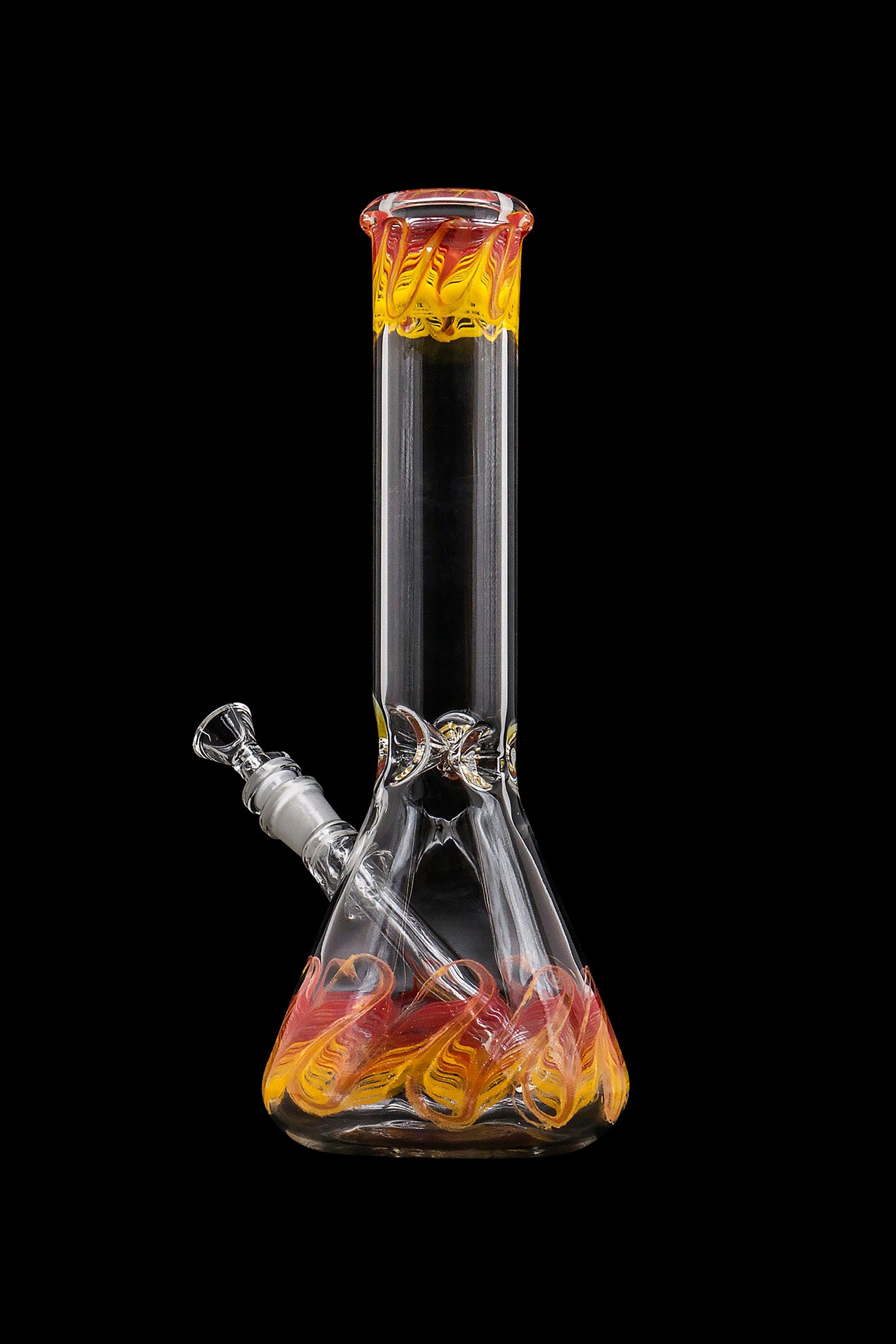 Glass water pipe with orange and yellow swirling patterns, isolated on a black background.