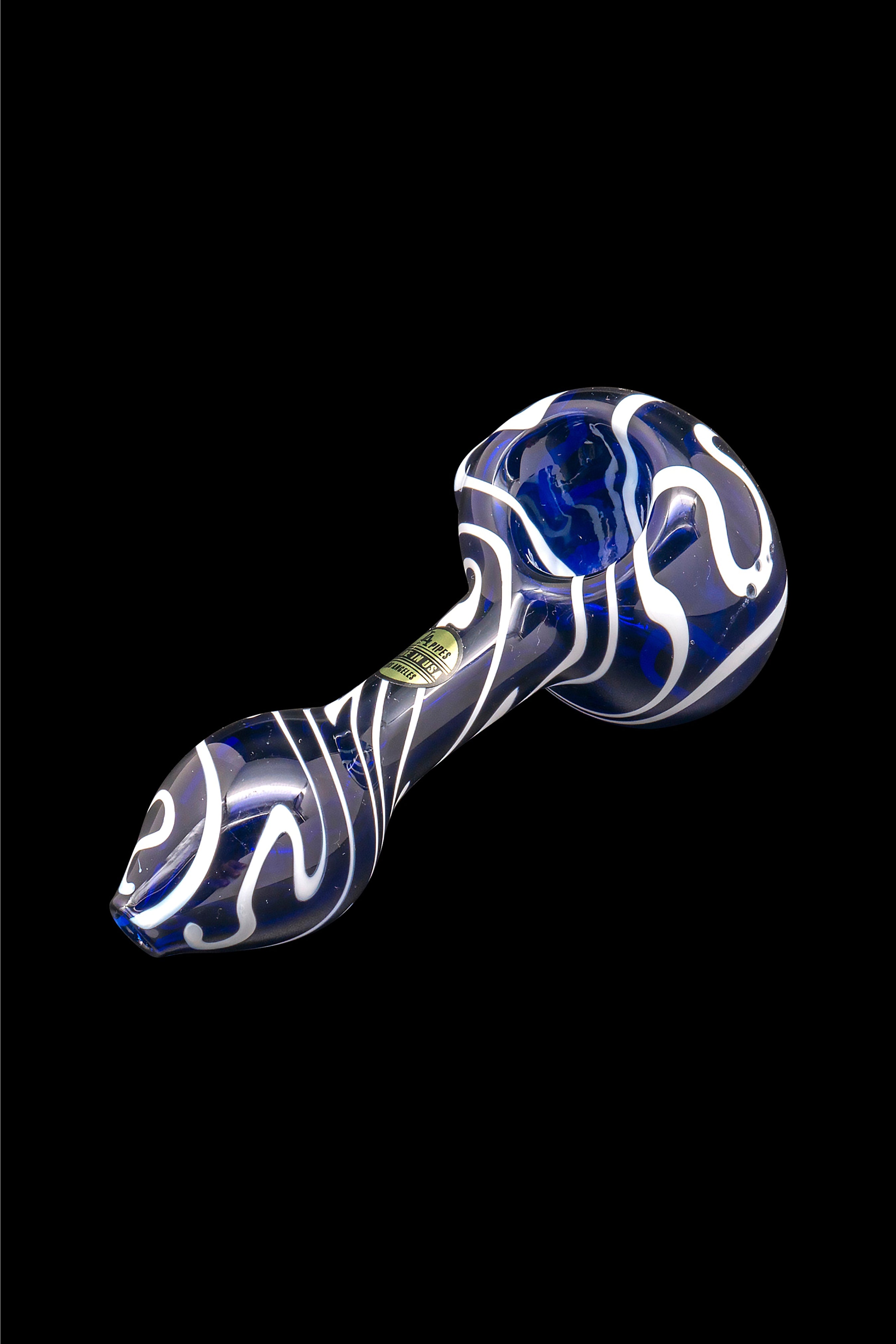 Blue and white swirled glass smoking pipe on a black background.