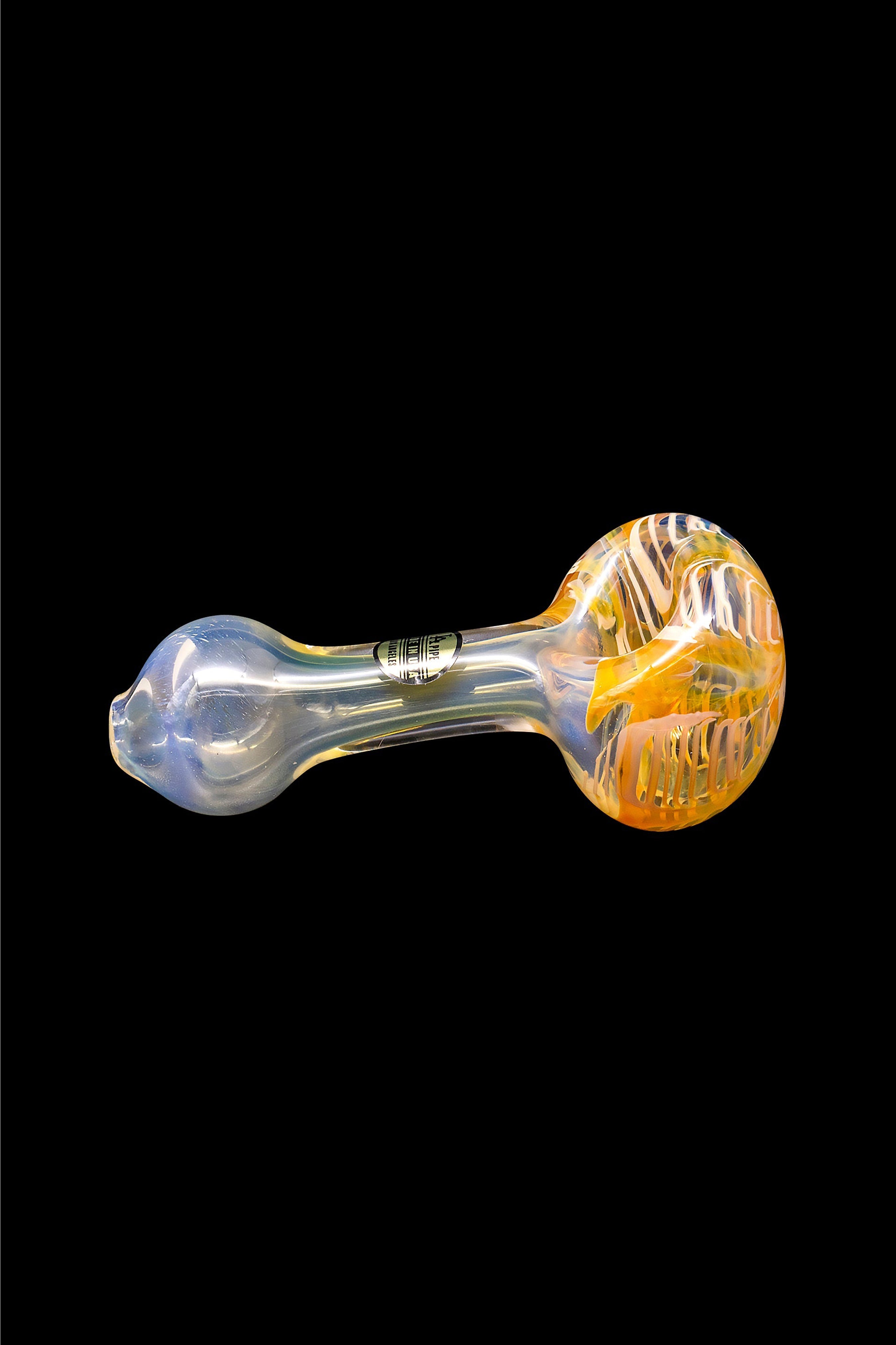 Hand pipe with colorful glass swirls.