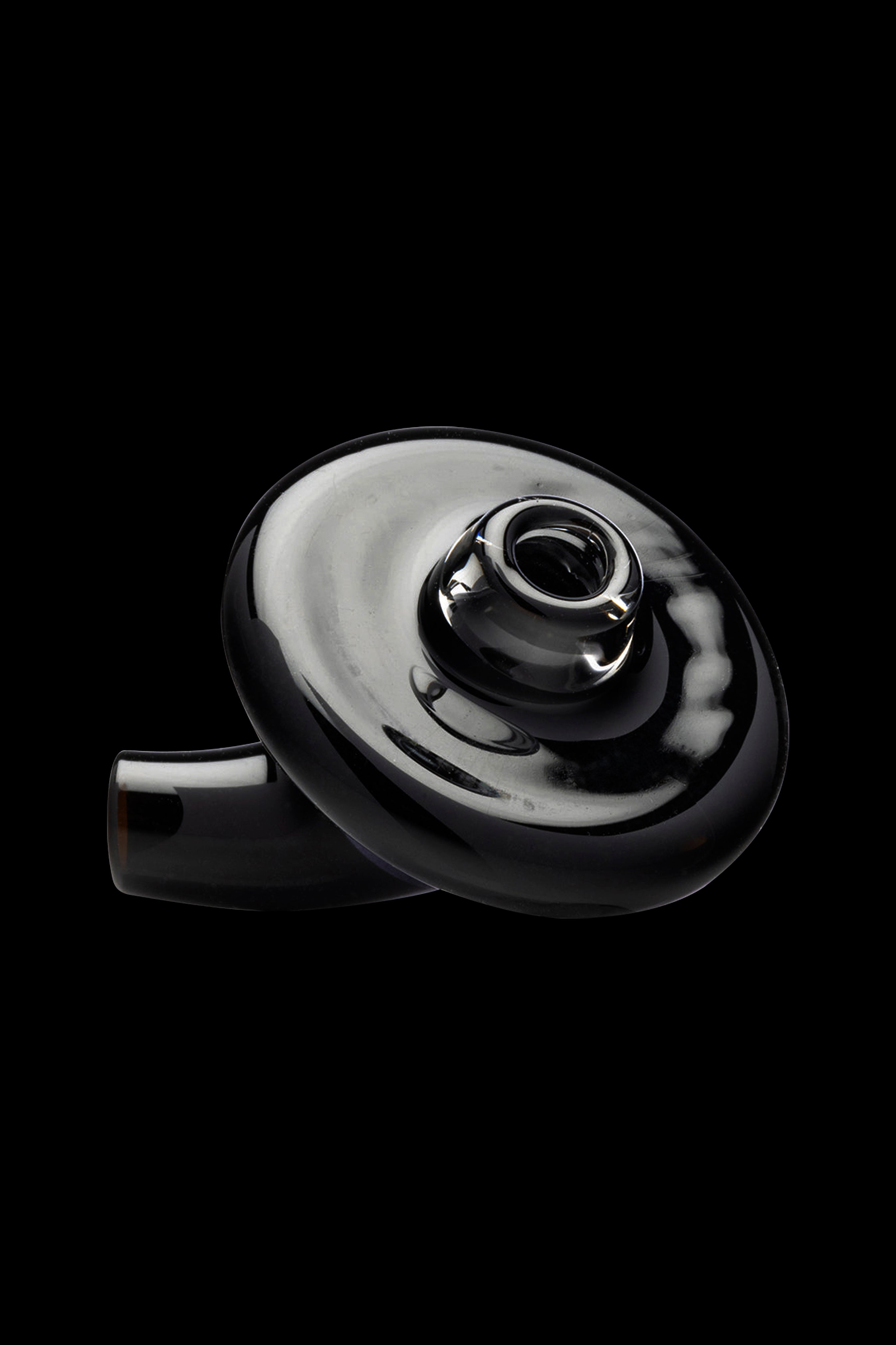 Black glass cannabis bubbler against a dark background.