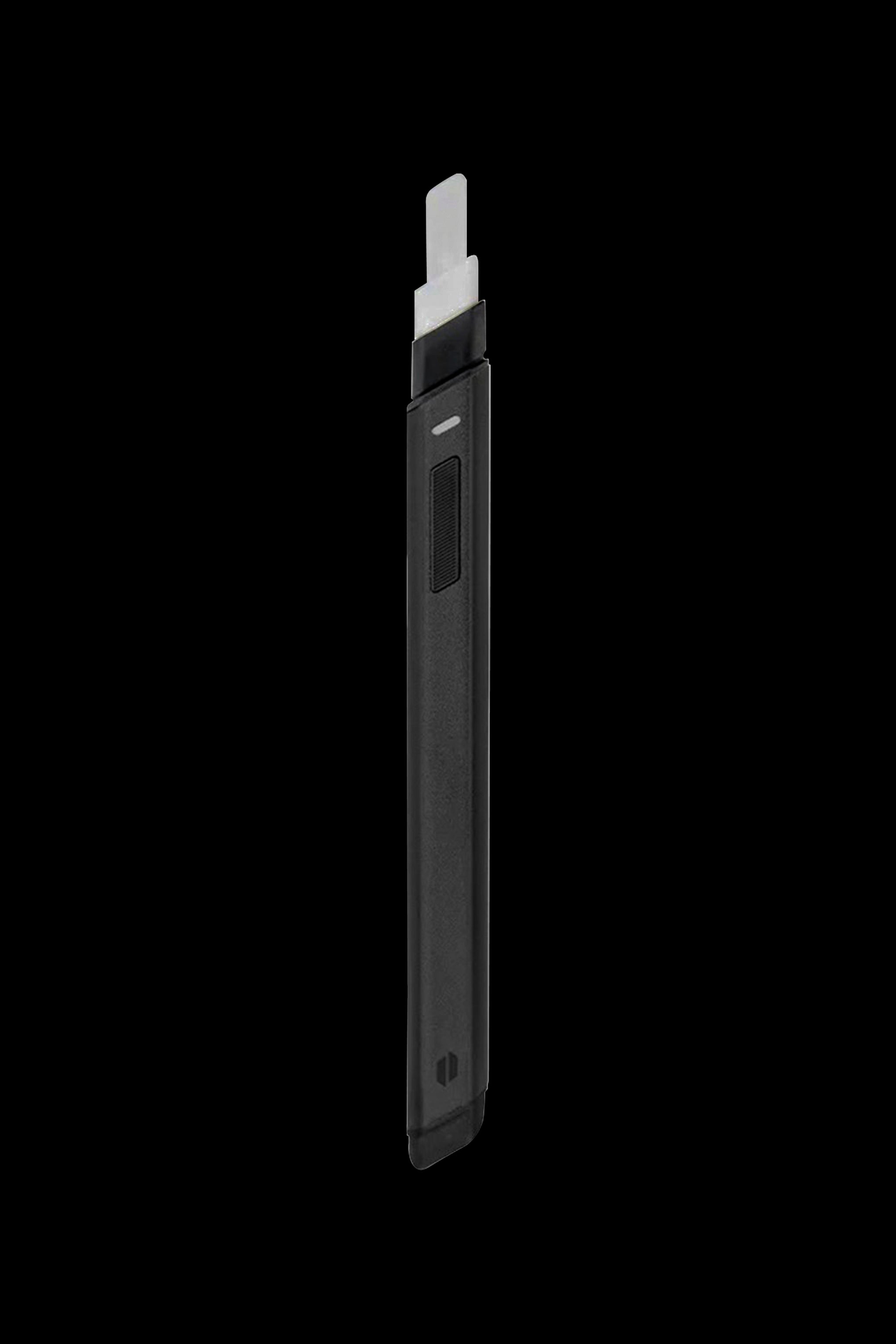 Sleek black cannabis oil vape pen isolated on a black background.