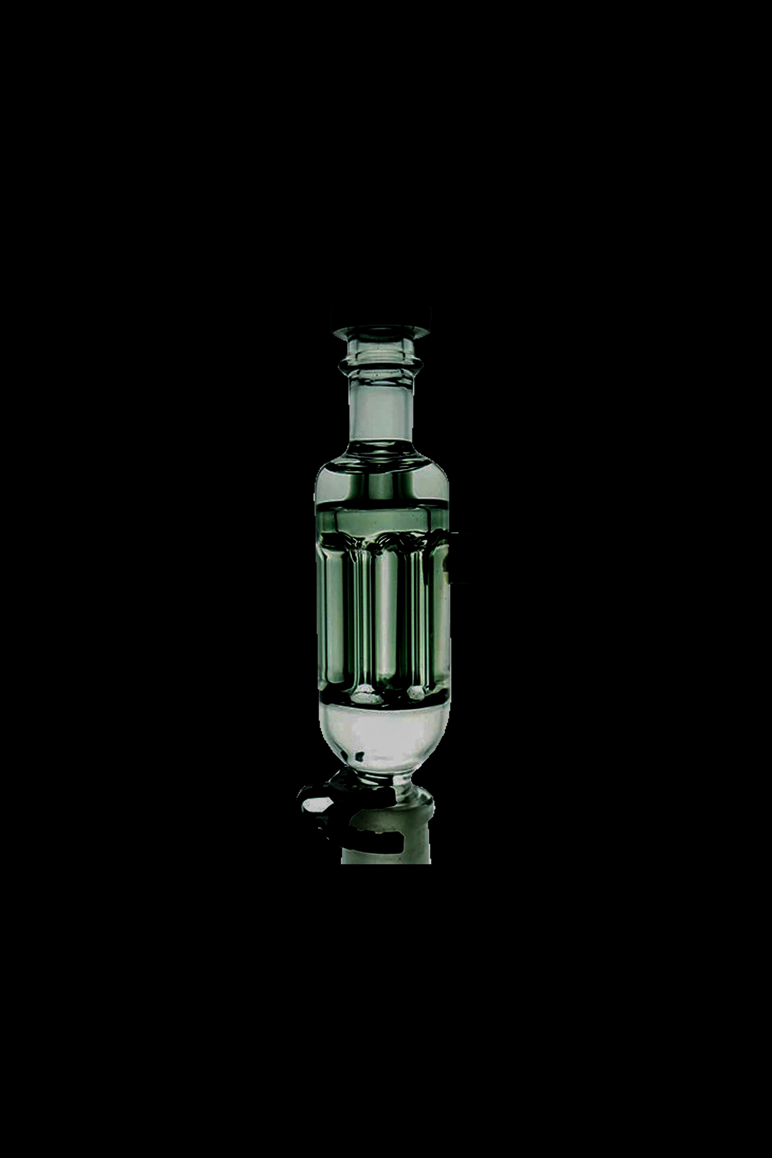 Green glass bubbler for cannabis consumption against a black background.