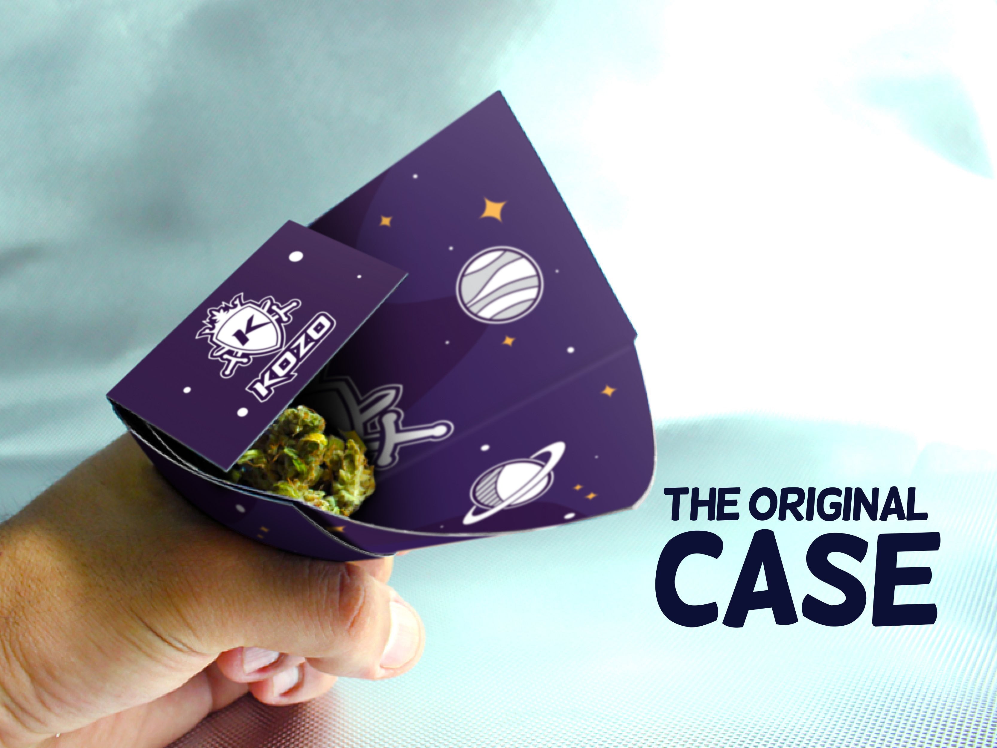 A hand holds a purple, space-themed container (“The Original Case”) filled with cannabis buds.