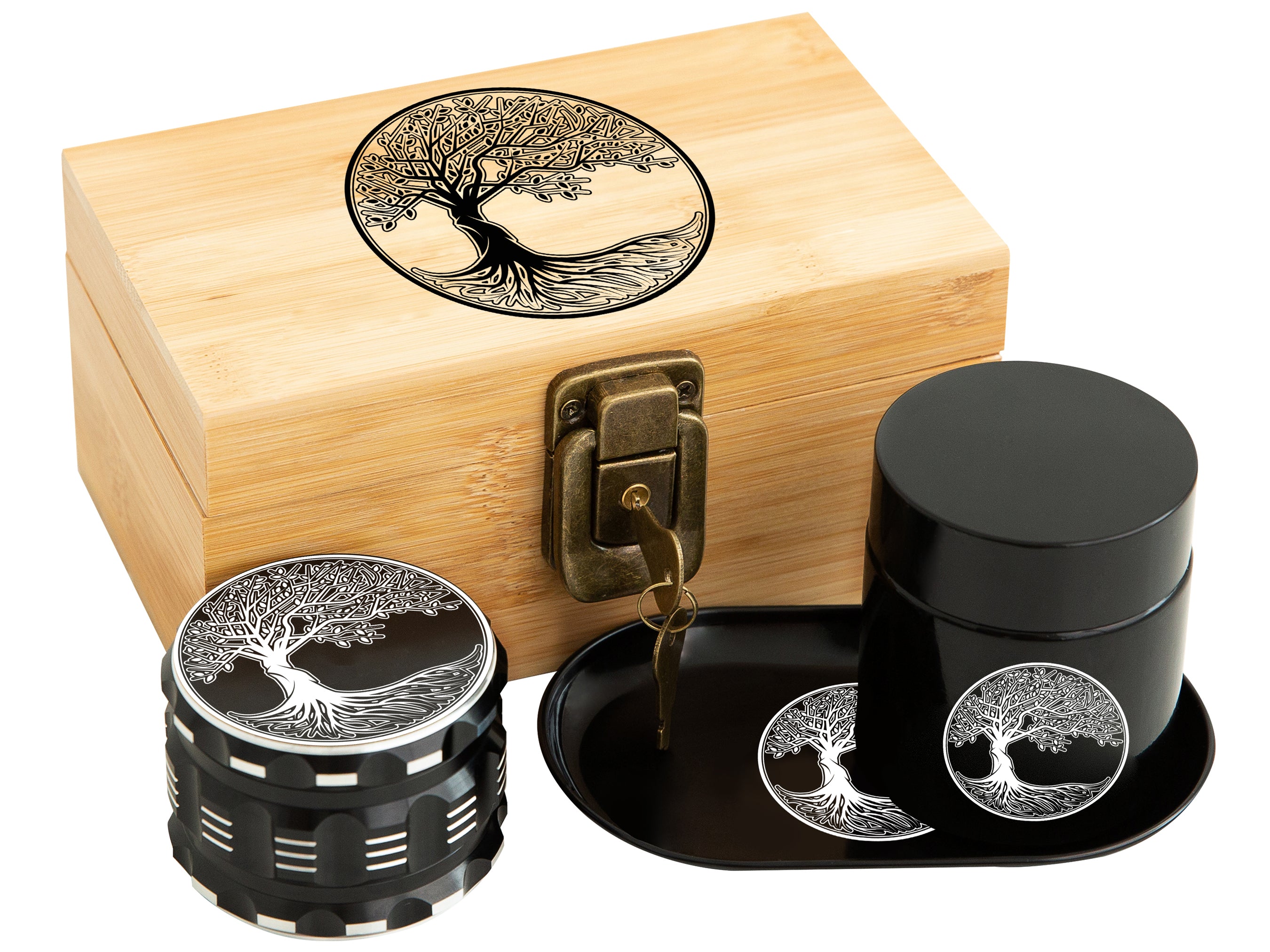 Wooden storage box with lock and key, alongside a grinder and airtight containers, all adorned with a tree of life design, likely for cannabis storage.