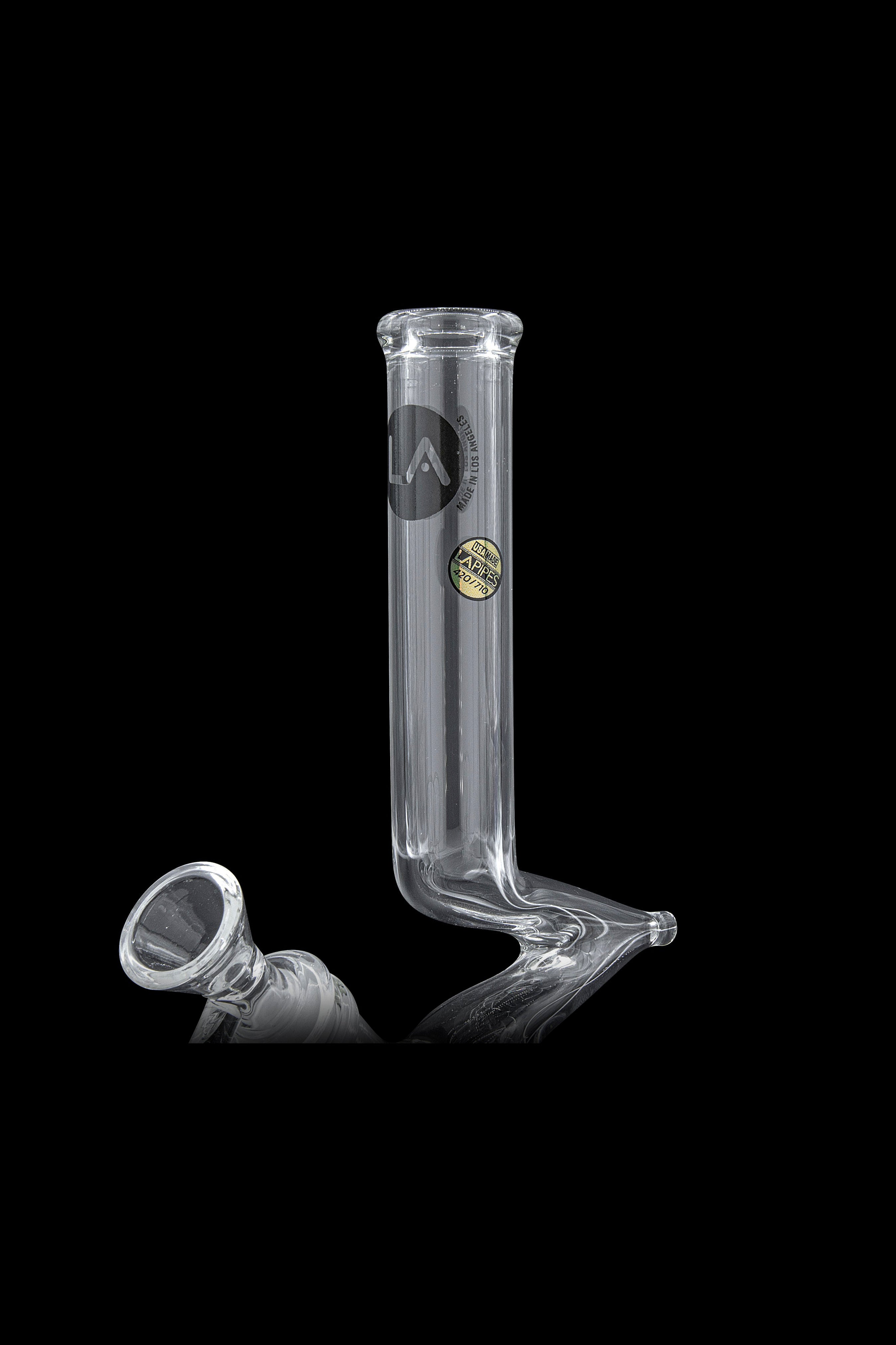 Clear glass bubbler with a flared mouthpiece and etched logo.