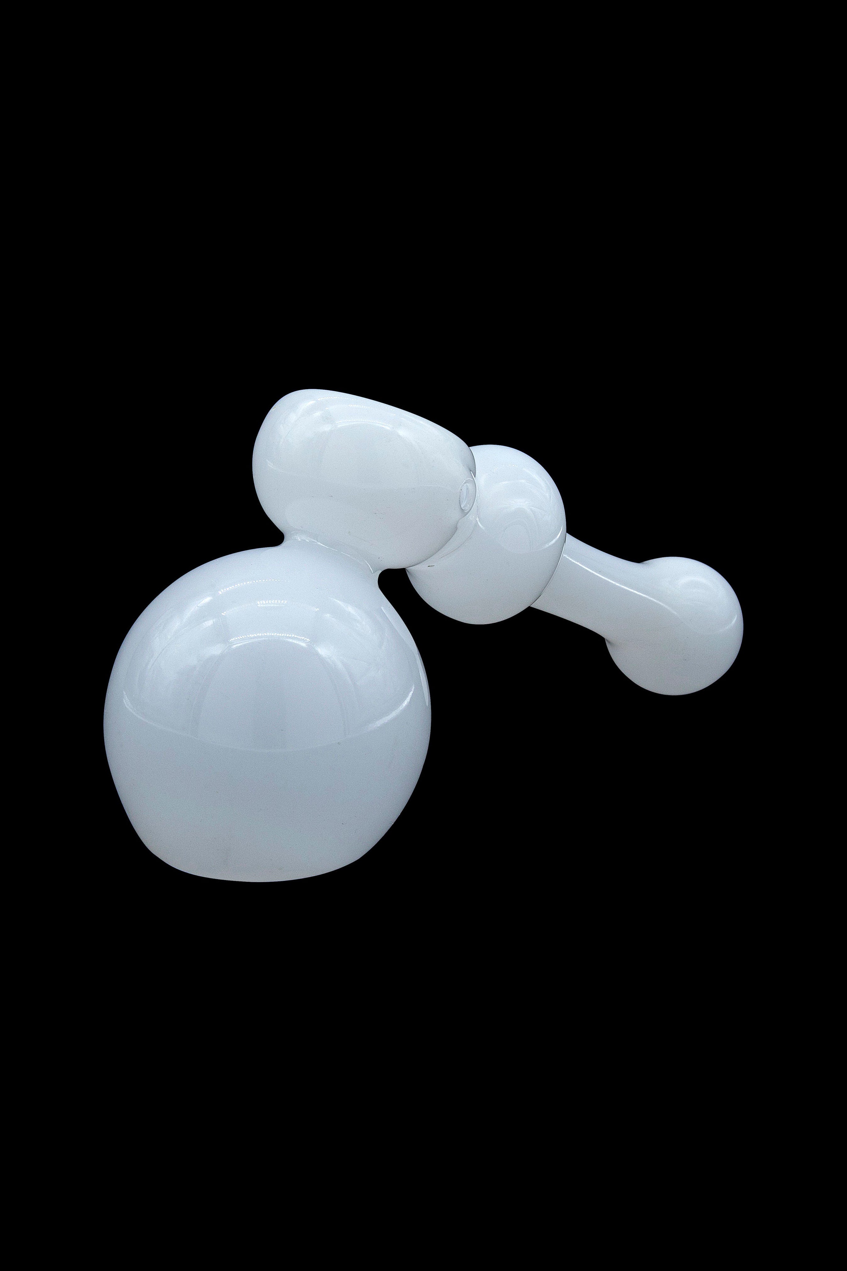 Glass dab rig with spherical and cylindrical components, isolated on a black background.