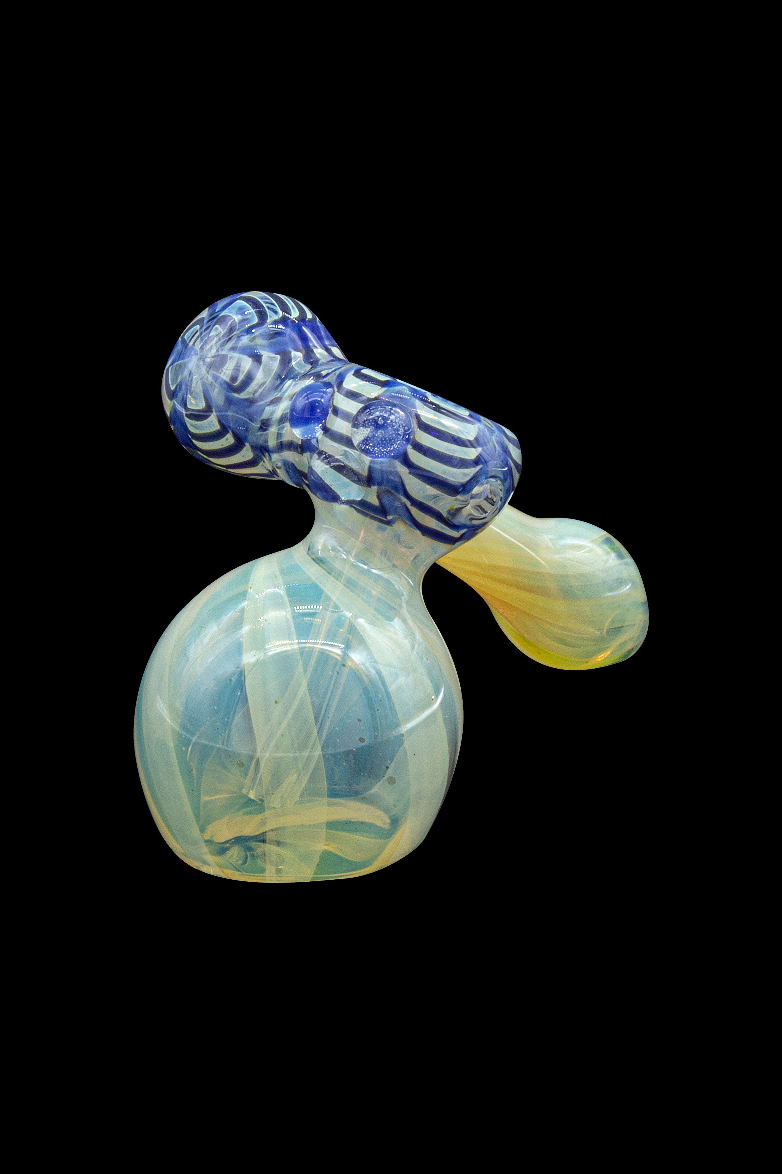 Hand-blown glass water pipe with blue and yellow swirls against a black background.