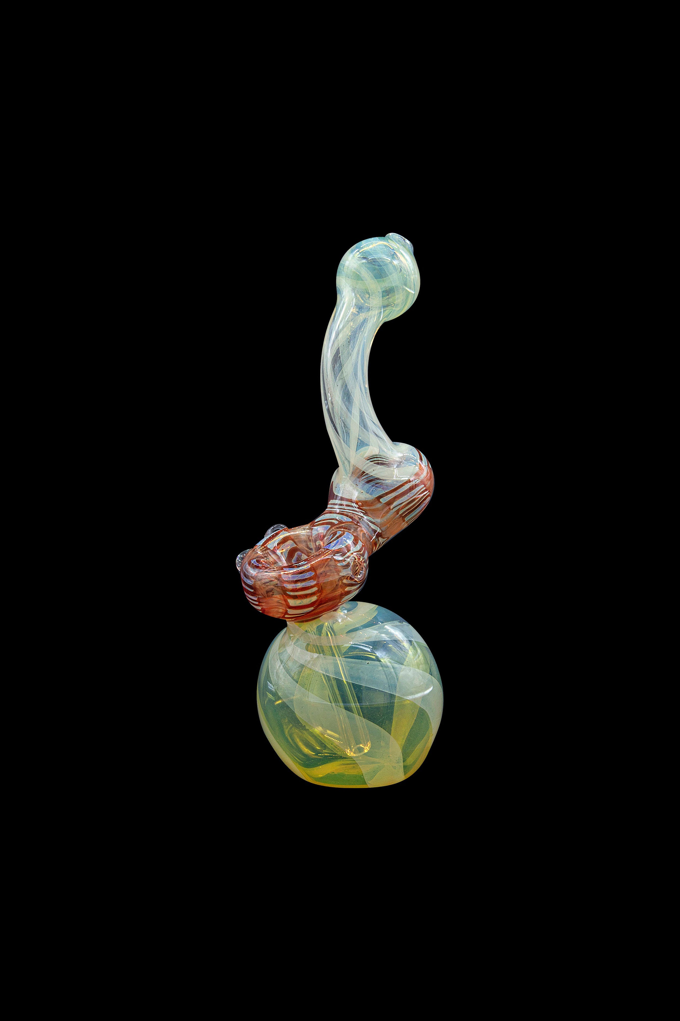 Hand-blown glass bubbler with swirling green and red patterns against a black background.