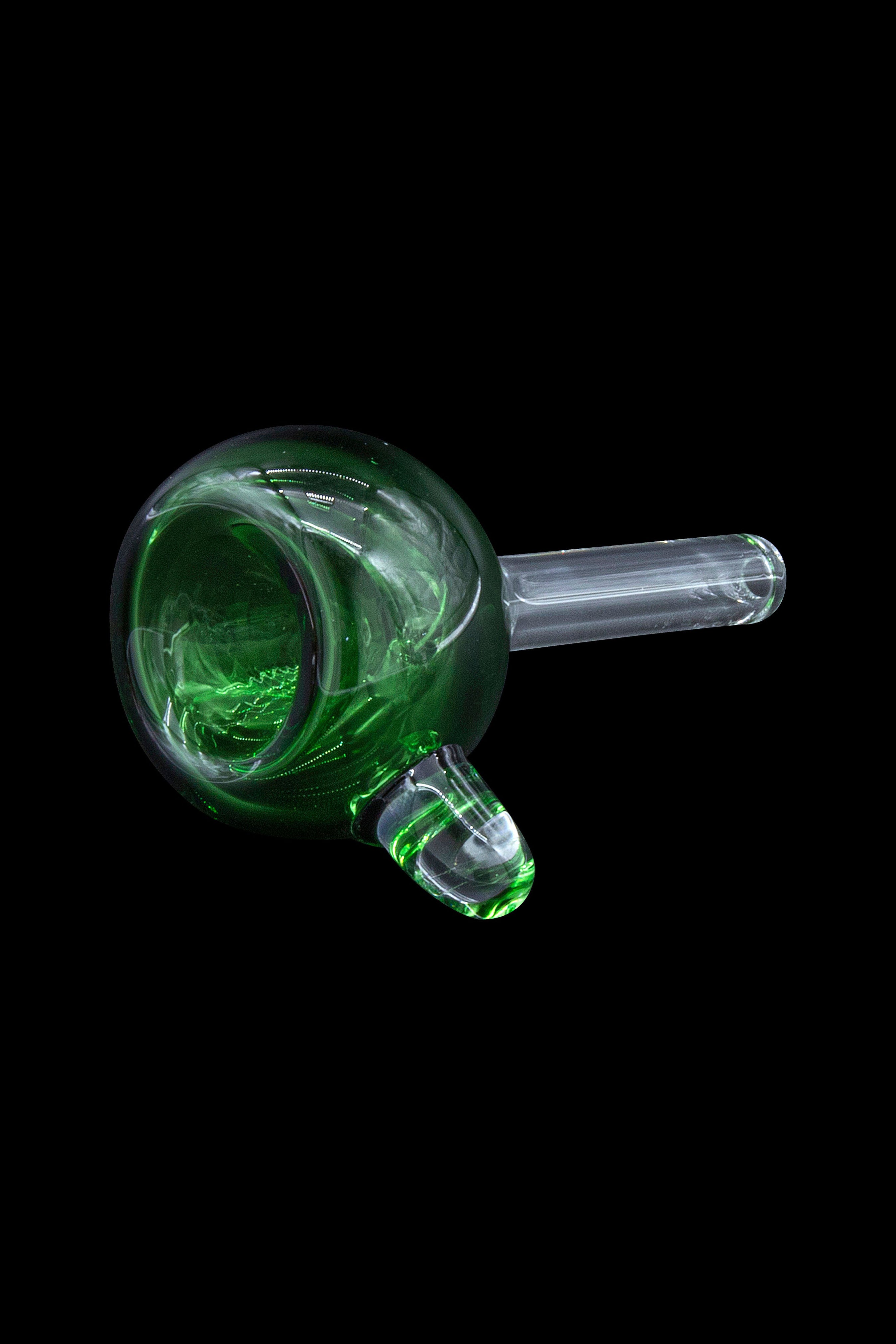 Green glass bubbler pipe on a black background.