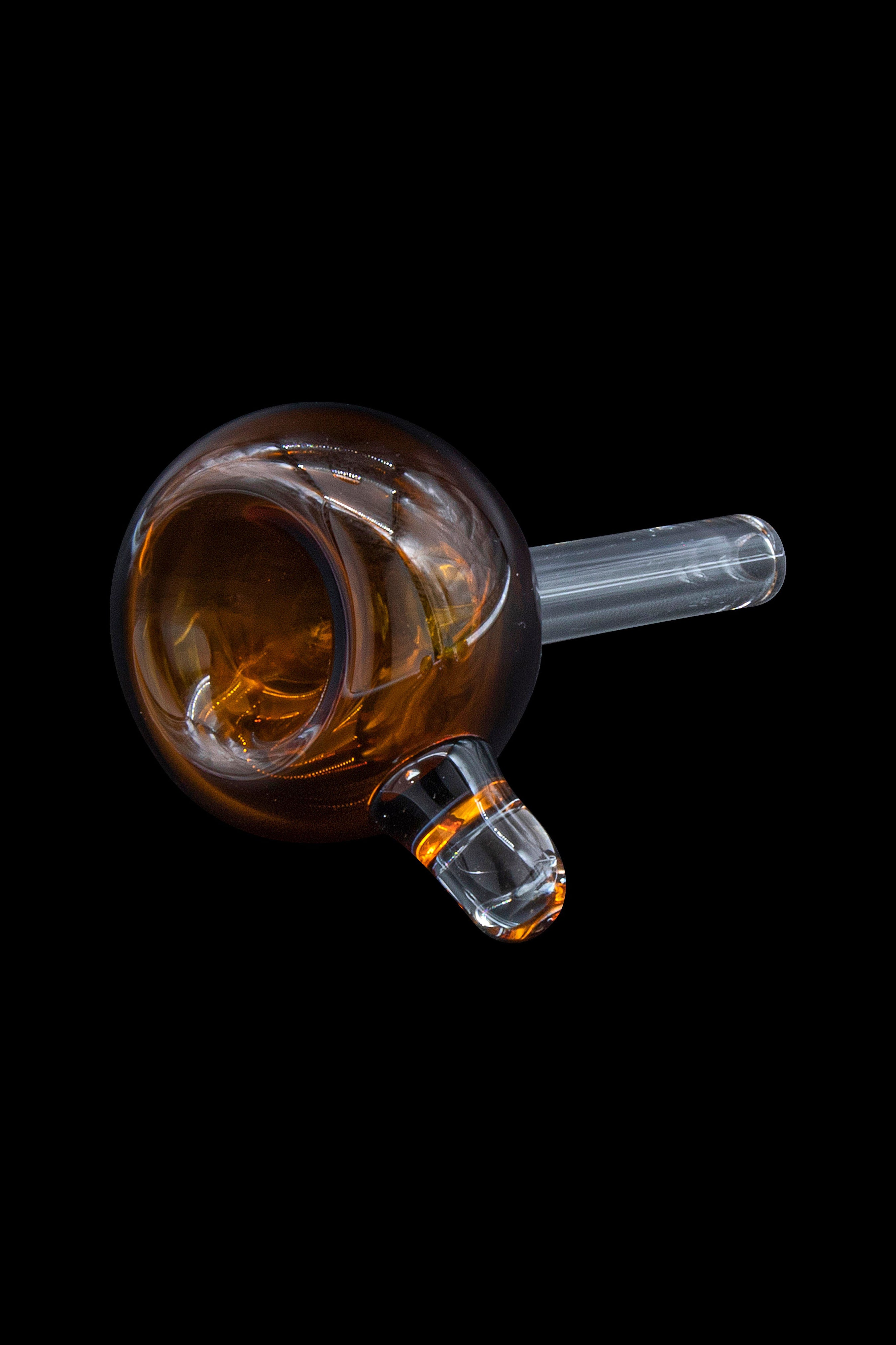 Amber glass bubbler with a clear mouthpiece, isolated on black.
