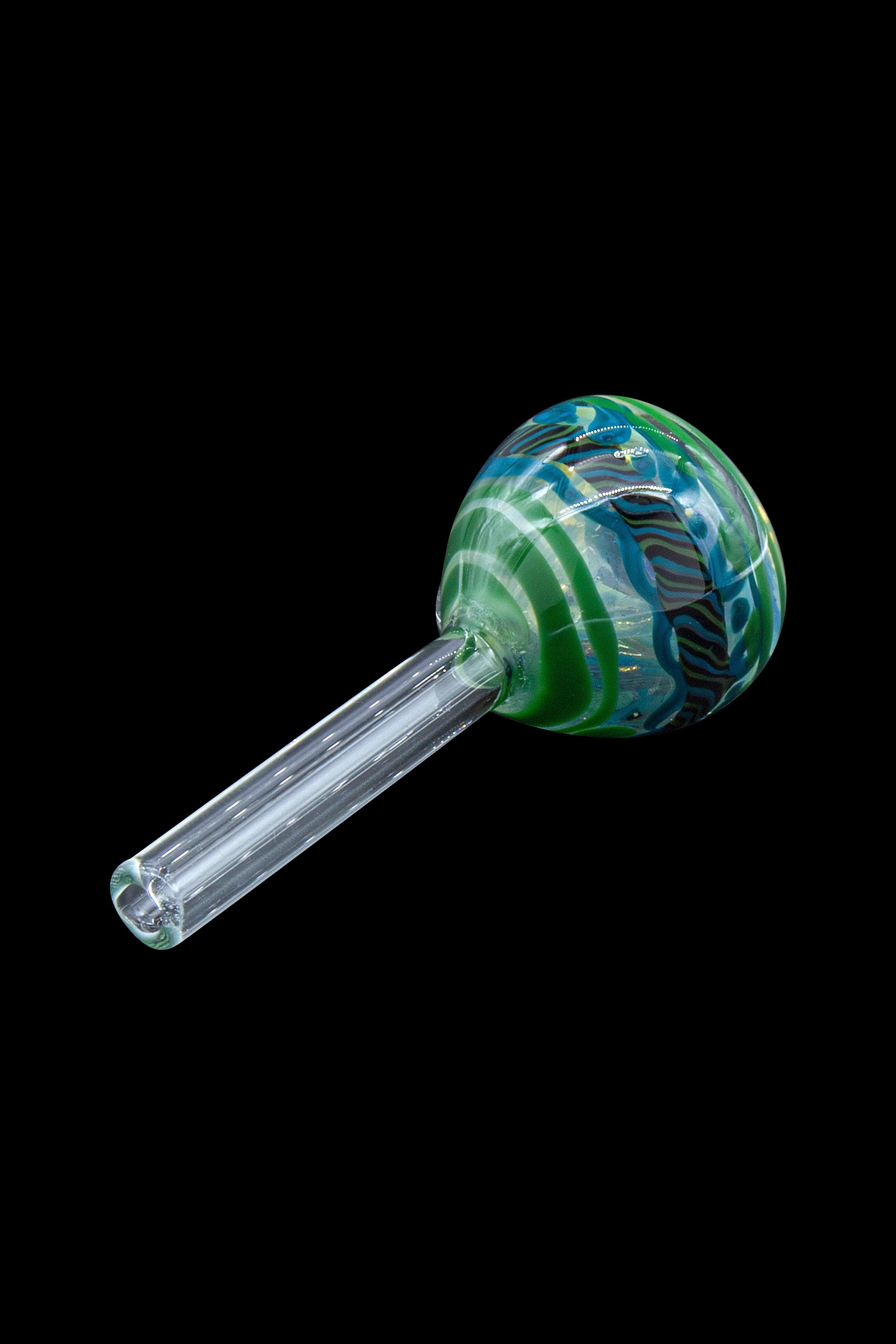 Glass cannabis oil burner pipe with colorful swirls.