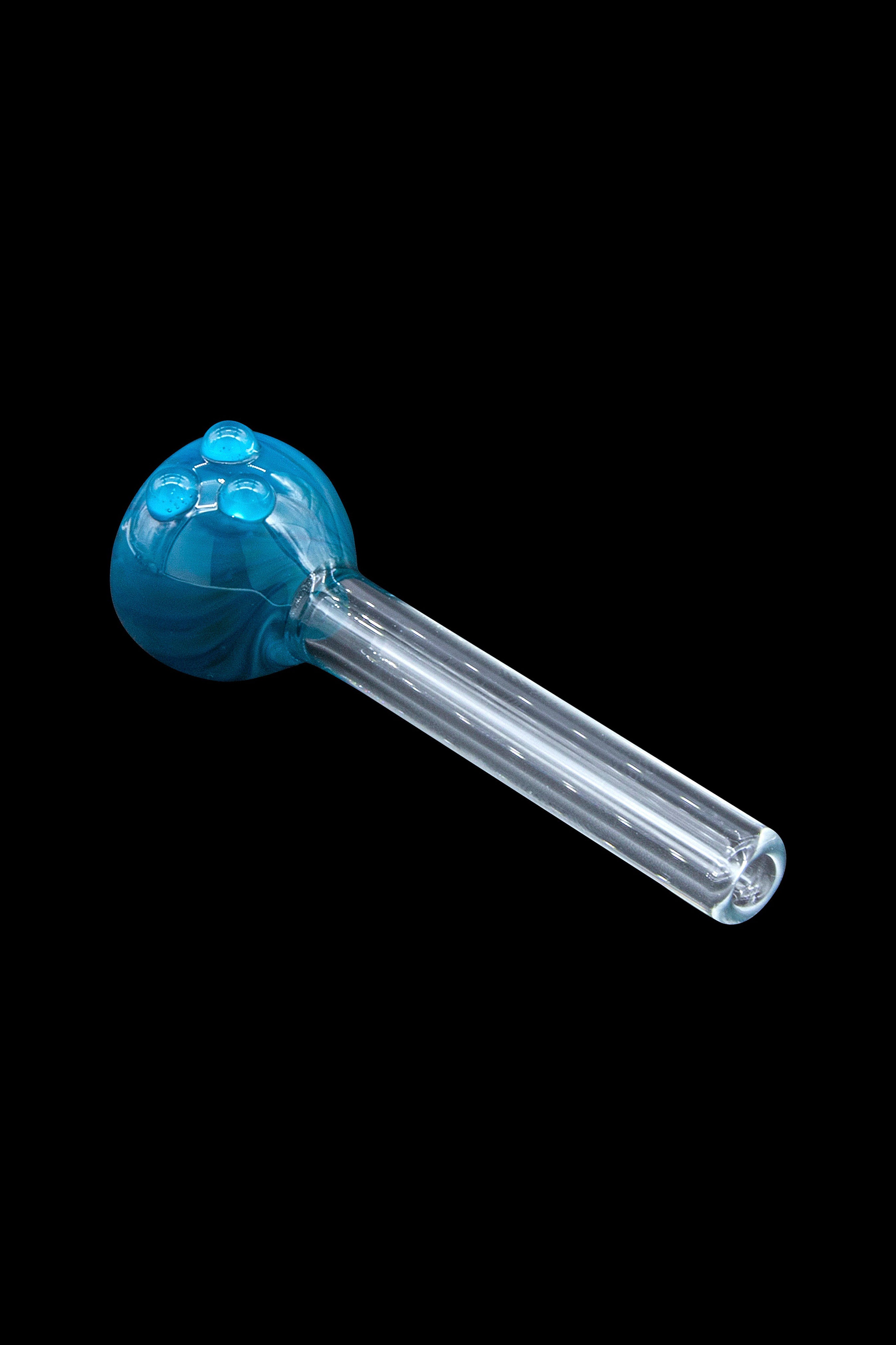 Blue glass smoking pipe isolated on a black background.