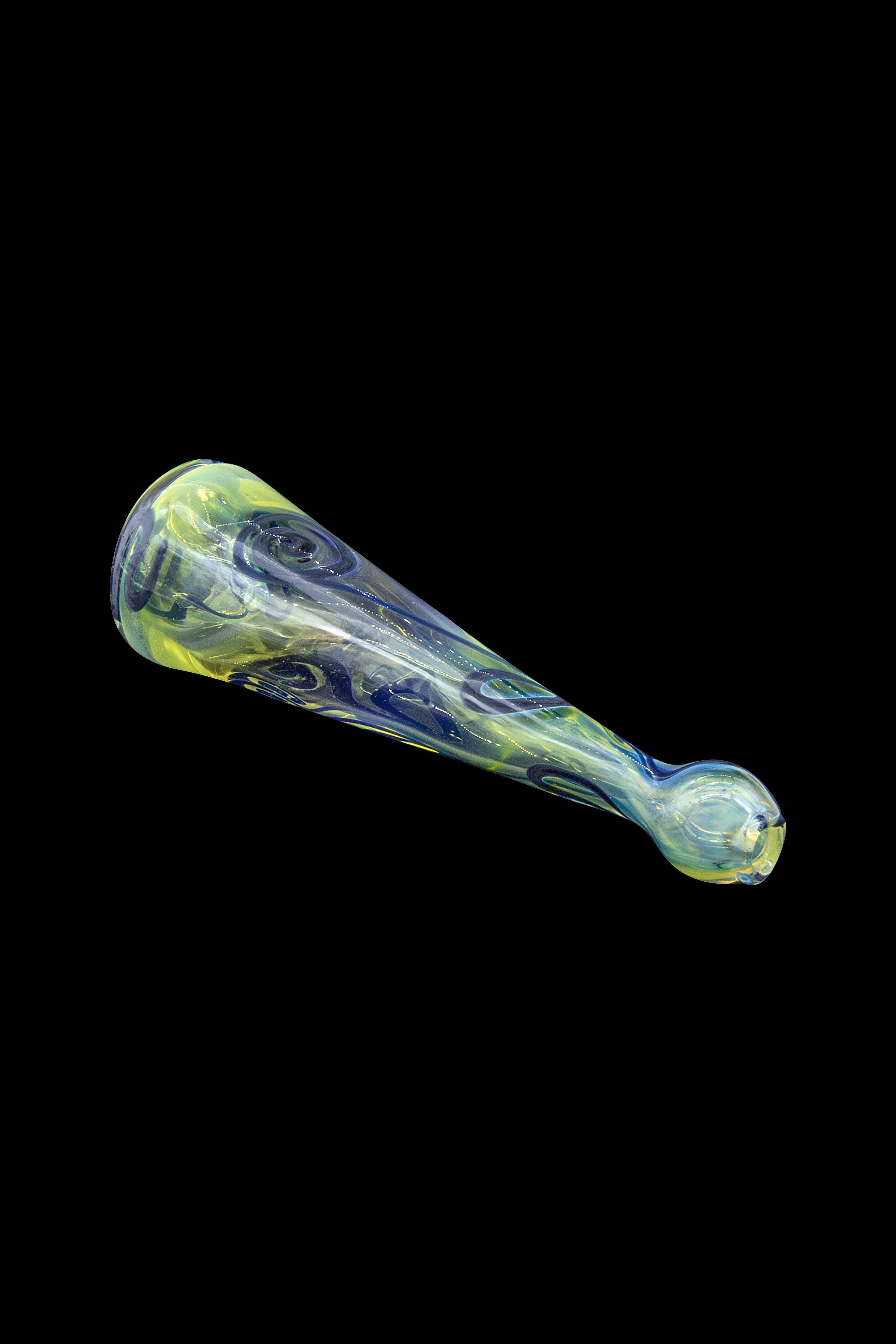 Hand-blown glass pipe with swirling green and yellow patterns.