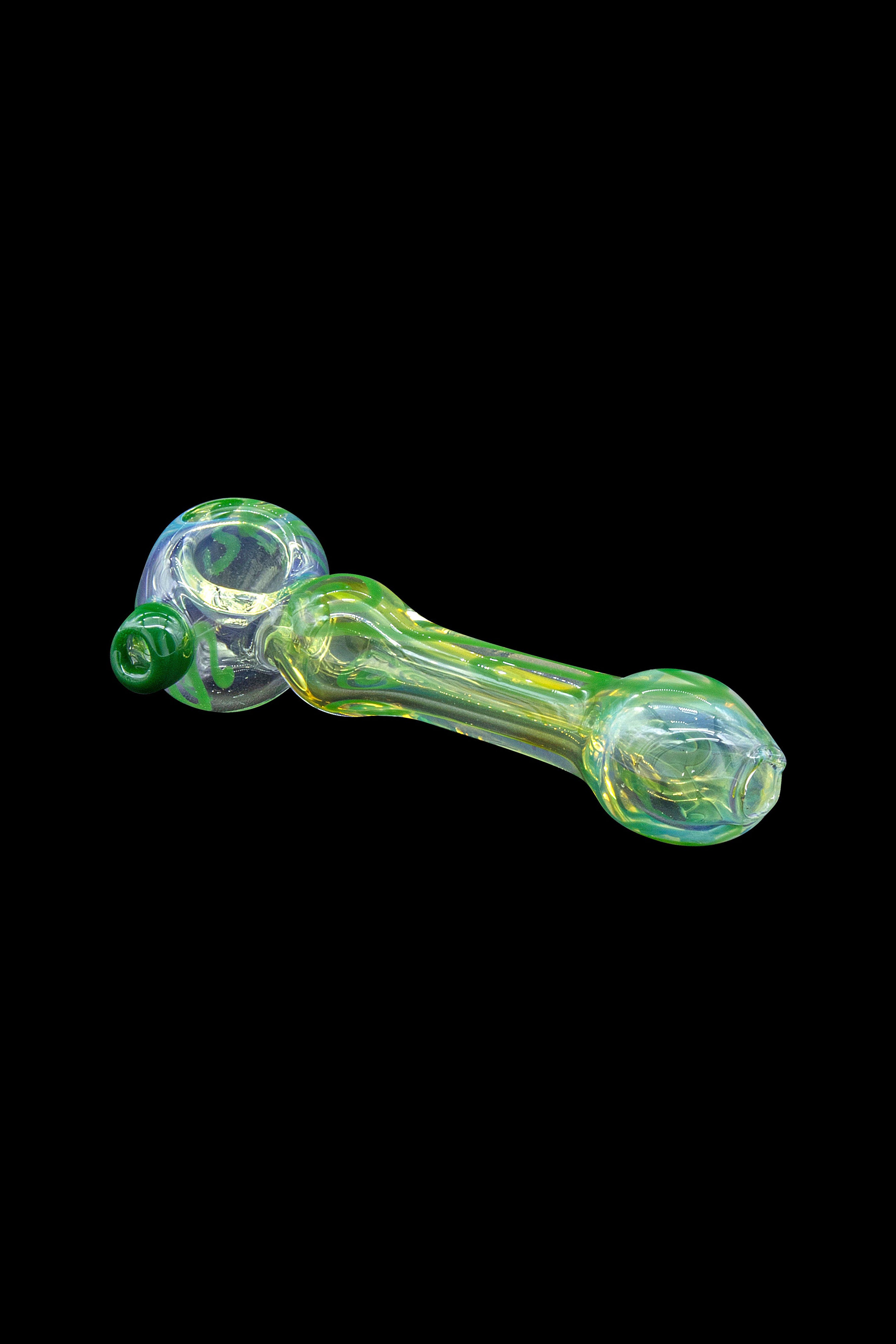 Green glass pipe with swirling patterns against a black background.