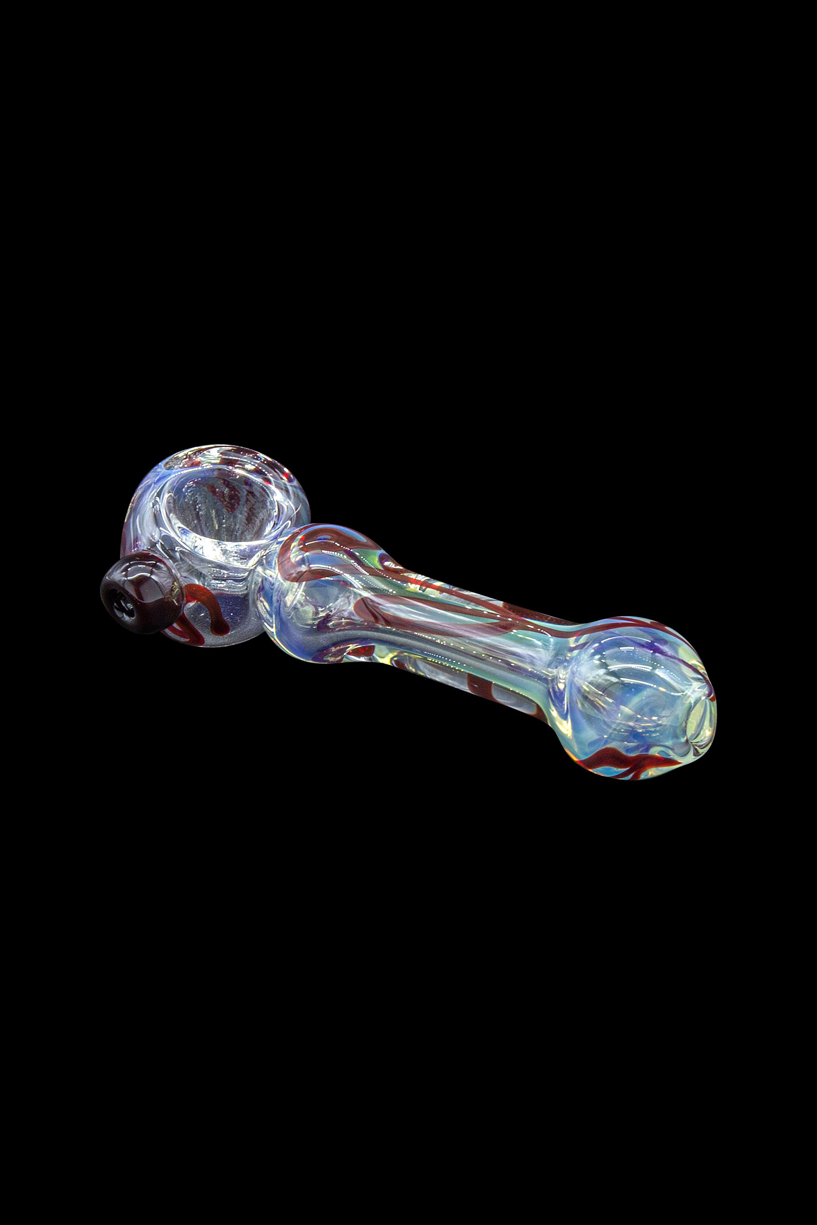 Hand pipe with red, white, and blue glass swirls on a black background.