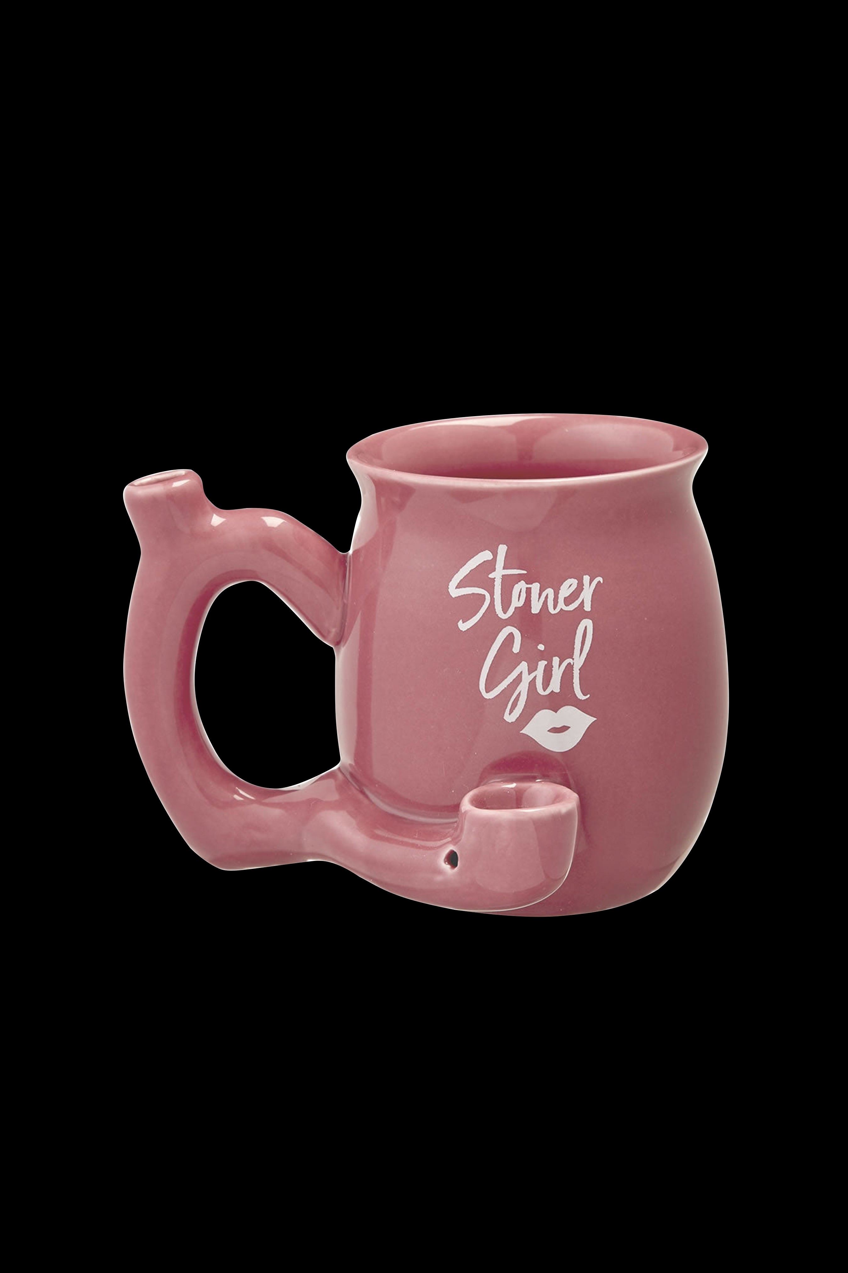 Pink ceramic water pipe shaped like a mug with “Stoner Girl” and lip graphic.