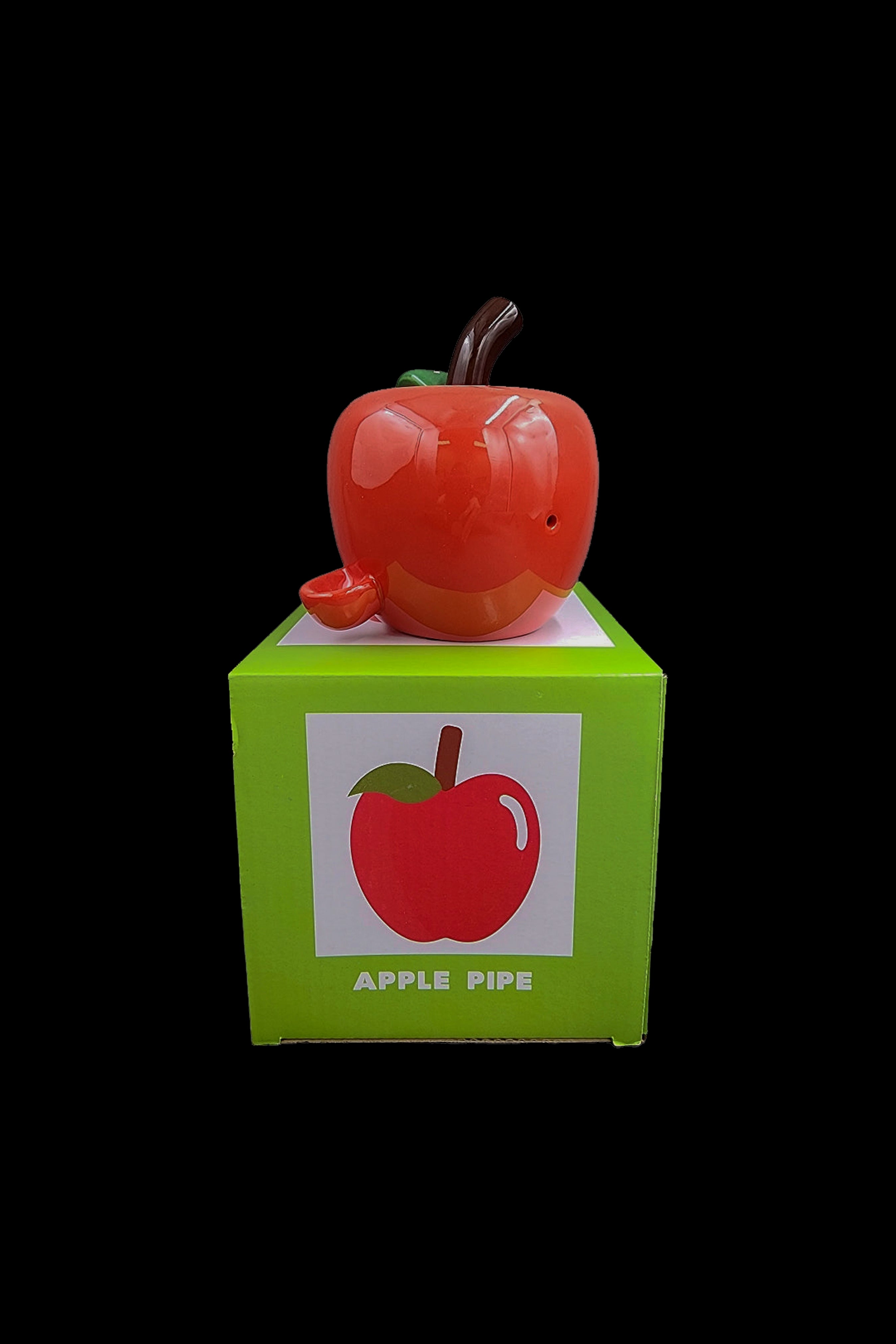 Red apple-shaped smoking pipe on its branded green box.
