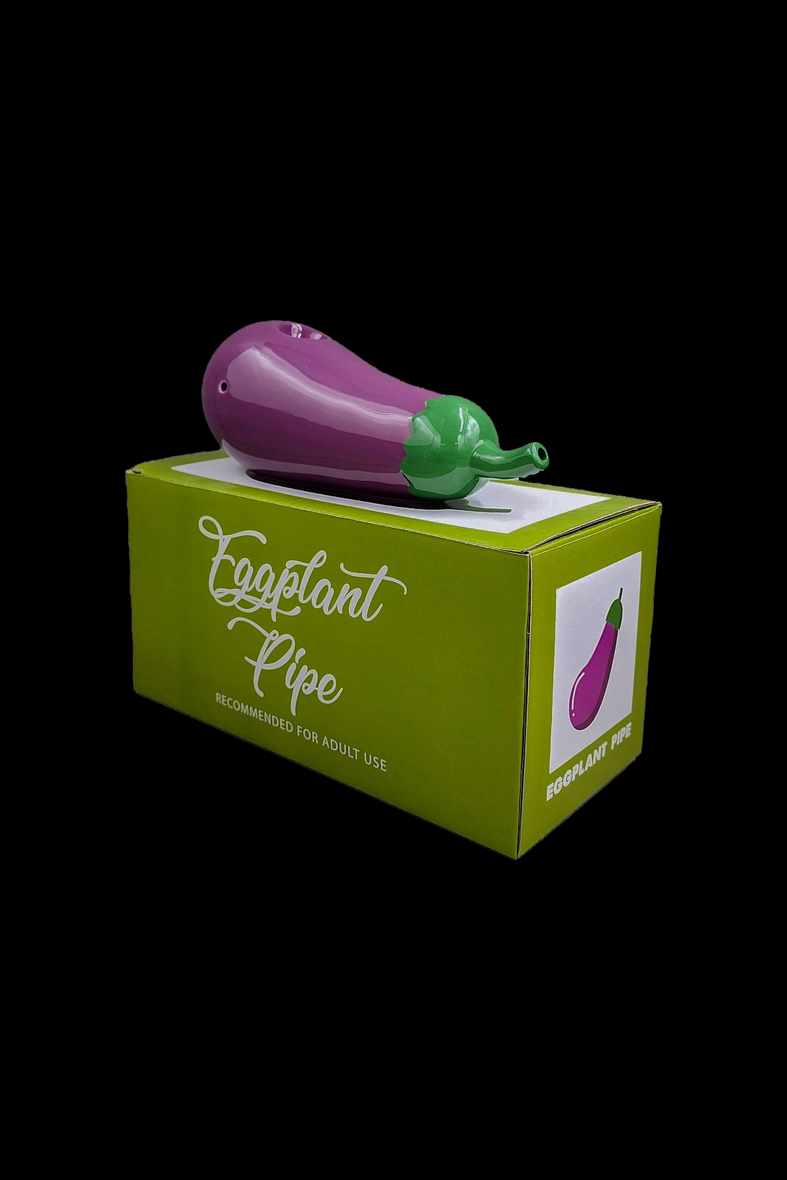 A novelty glass pipe shaped like an eggplant in its packaging, labeled "Eggplant Pipe" and “Recommended for adult use.”