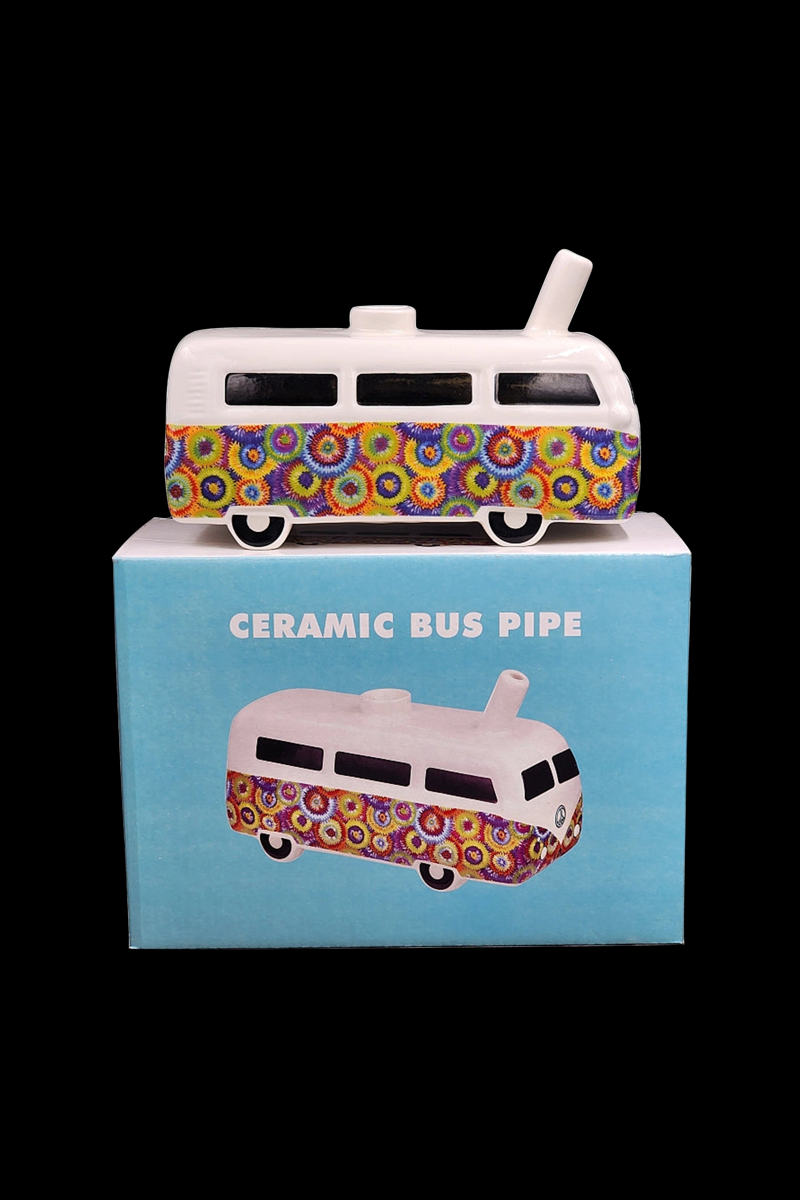 Ceramic cannabis pipe shaped like a colorful vintage Volkswagen van, displayed with its retail box.