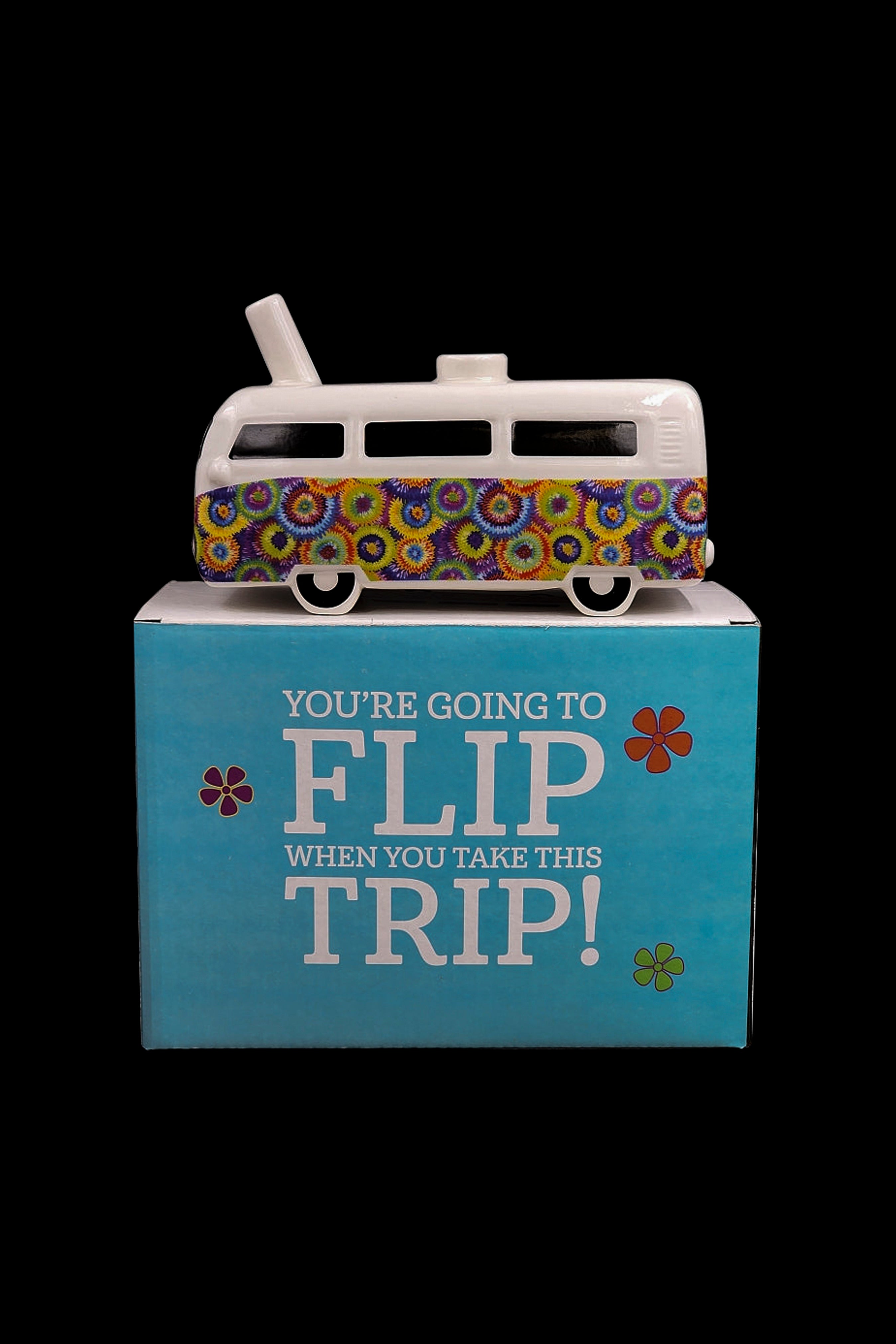 A colorful box with a vintage van on top, reading "You're Going to Flip Trip!" in psychedelic lettering, suggesting a cannabis-related product.