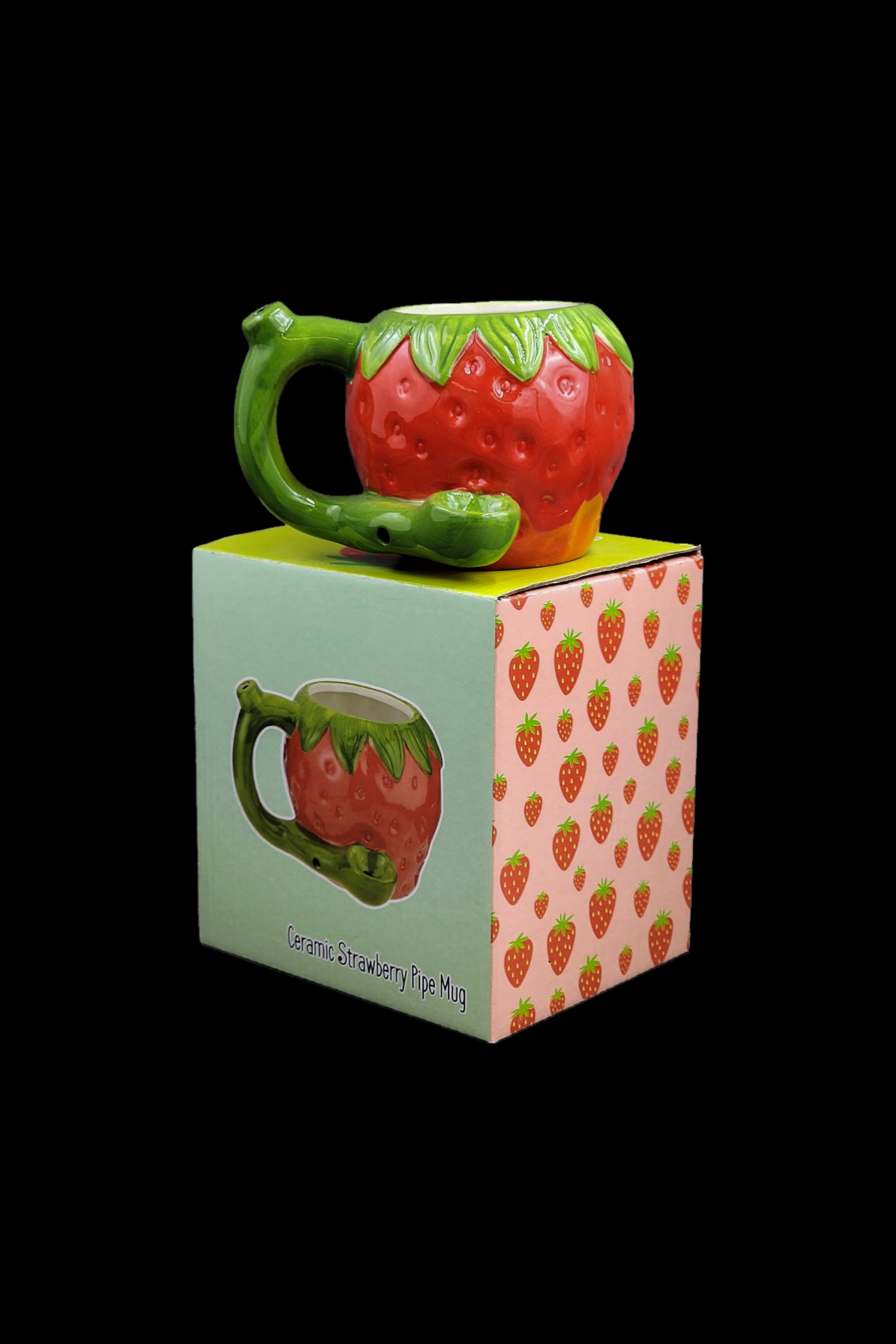 Red ceramic strawberry-shaped smoking pipe with its patterned box.
