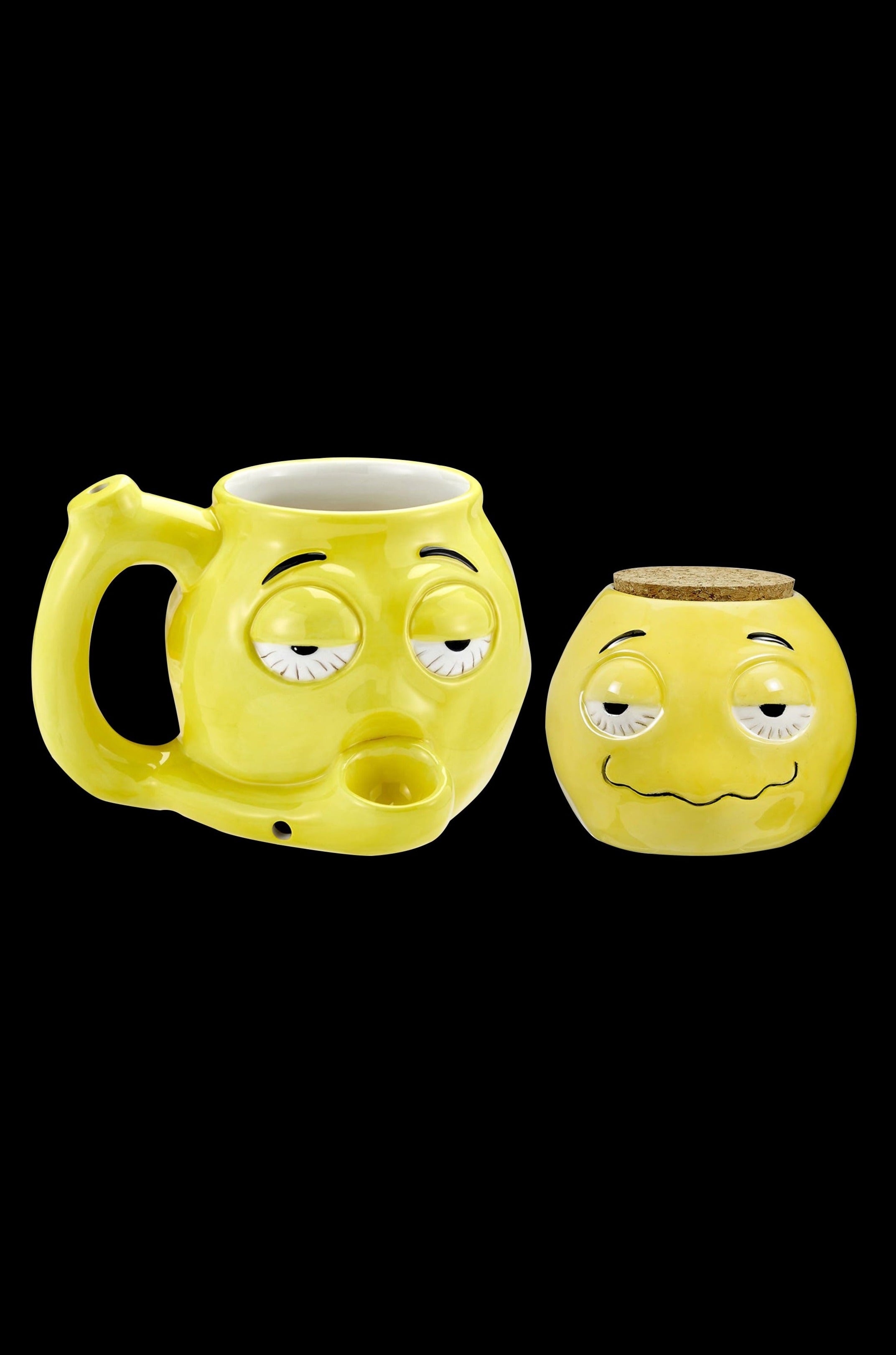 Yellow ceramic smoking set with cartoon faces, including a mug with a bowl and a cork-topped container.