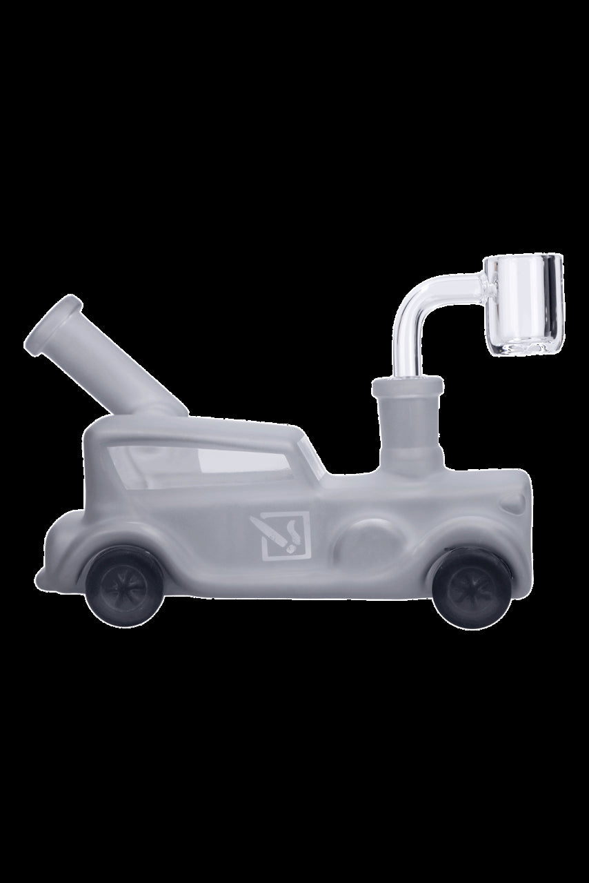 Frosted glass water pipe shaped like a classic car with a quartz banger.