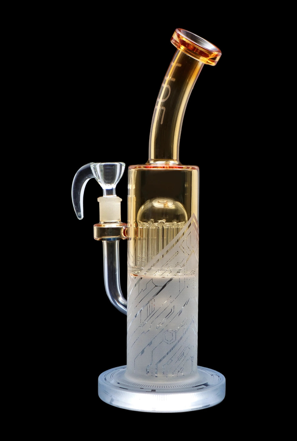 Glass water pipe (bong) with intricate etched design and amber mouthpiece, isolated on black.