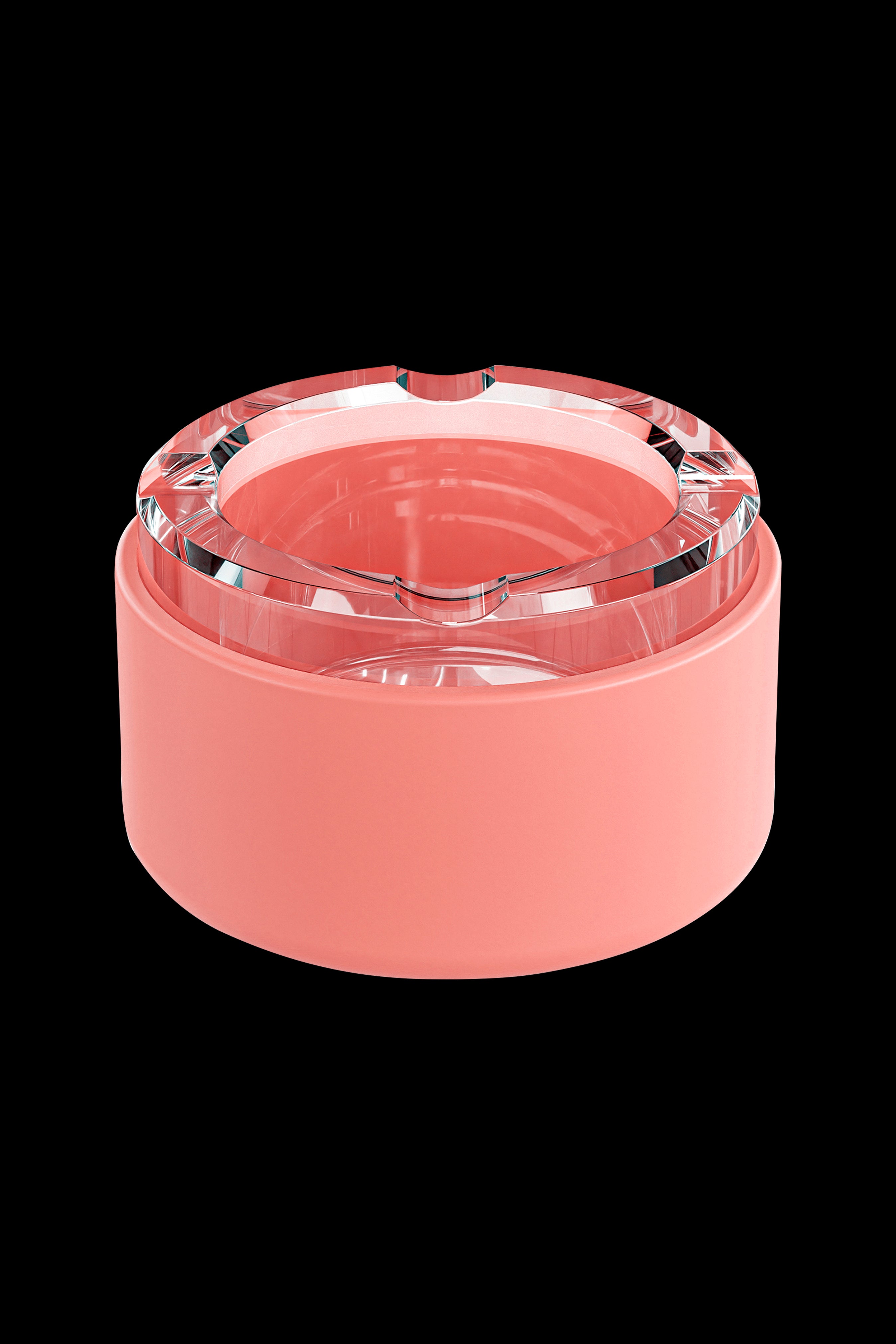 Coral-colored cannabis grinder with clear acrylic top.