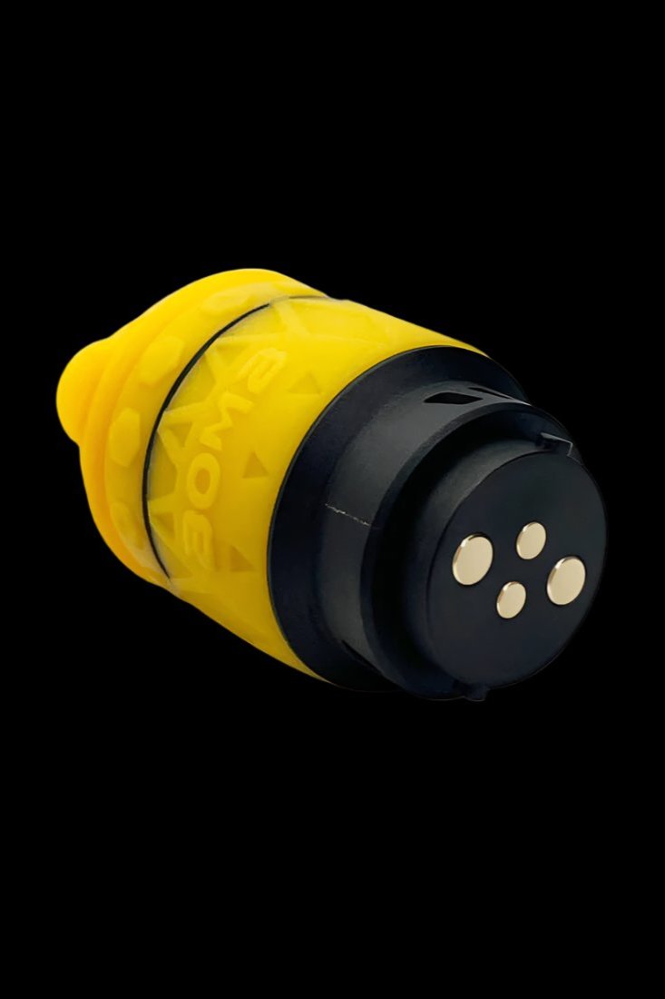 Yellow and black cannabis oil cartridge with a ceramic tip.