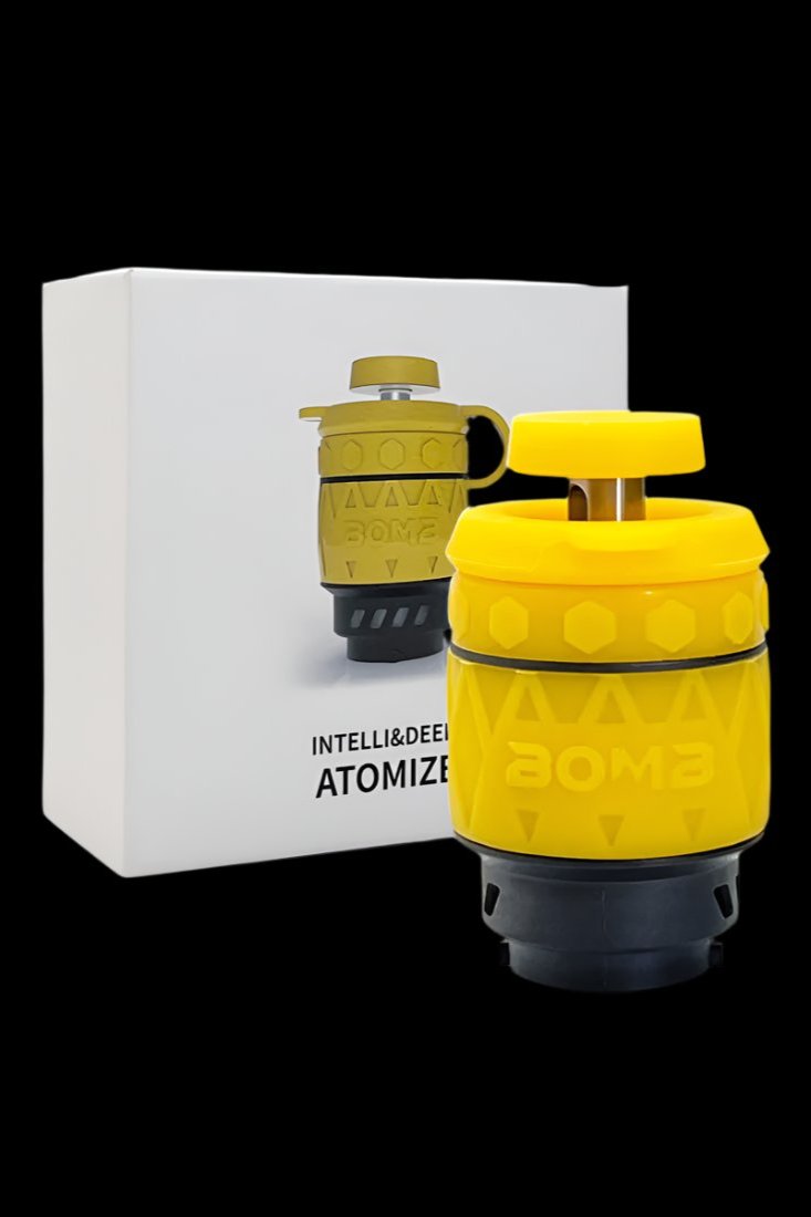 Yellow grenade-shaped cannabis vaporizer with packaging.