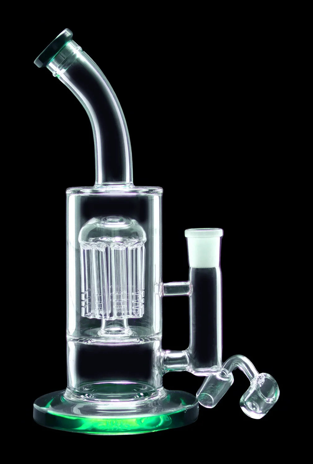 Clear glass water pipe (rig) with a perc diffuser and accompanying glass bowl, isolated on black.