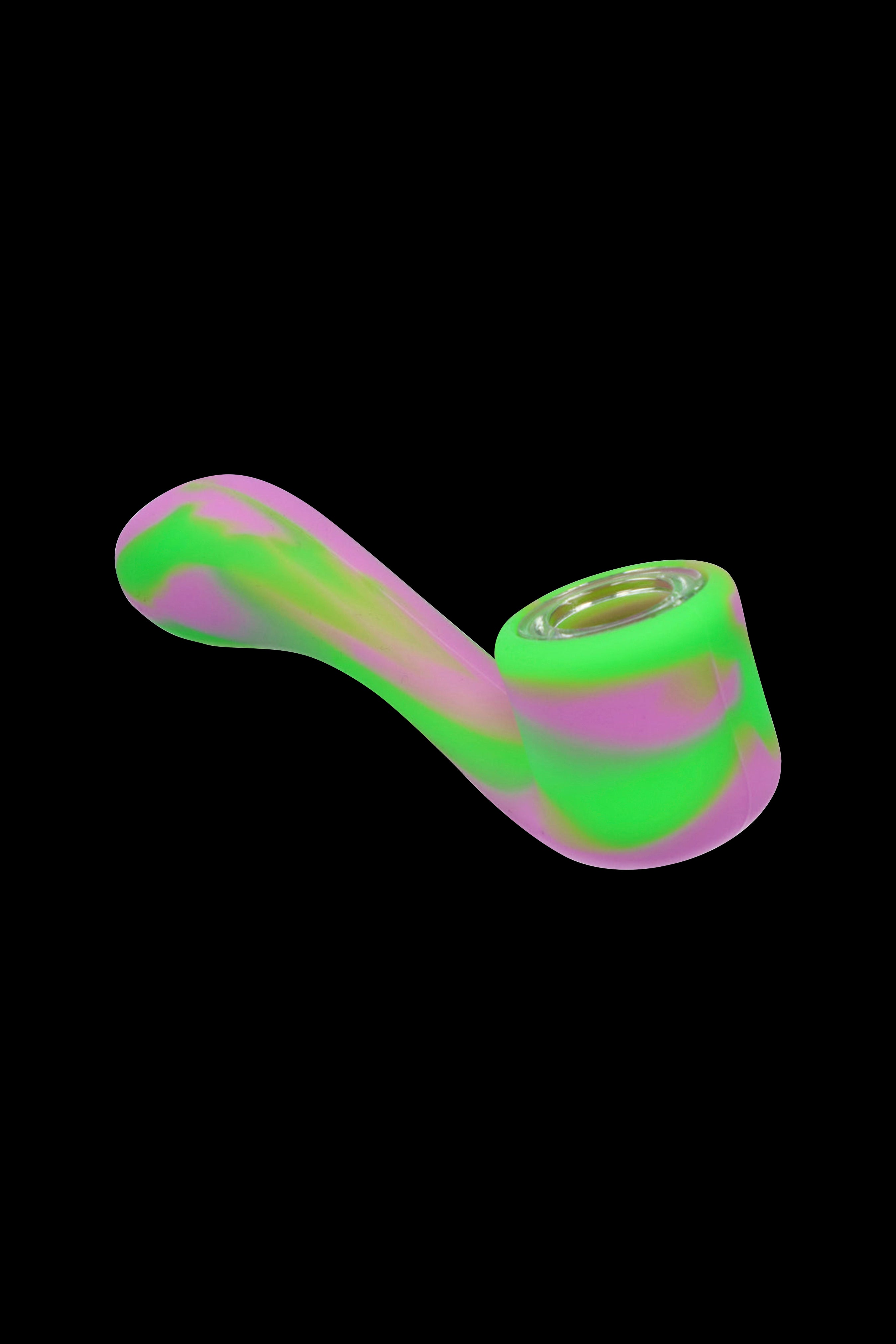 Neon green and pink silicone smoking pipe isolated on black.