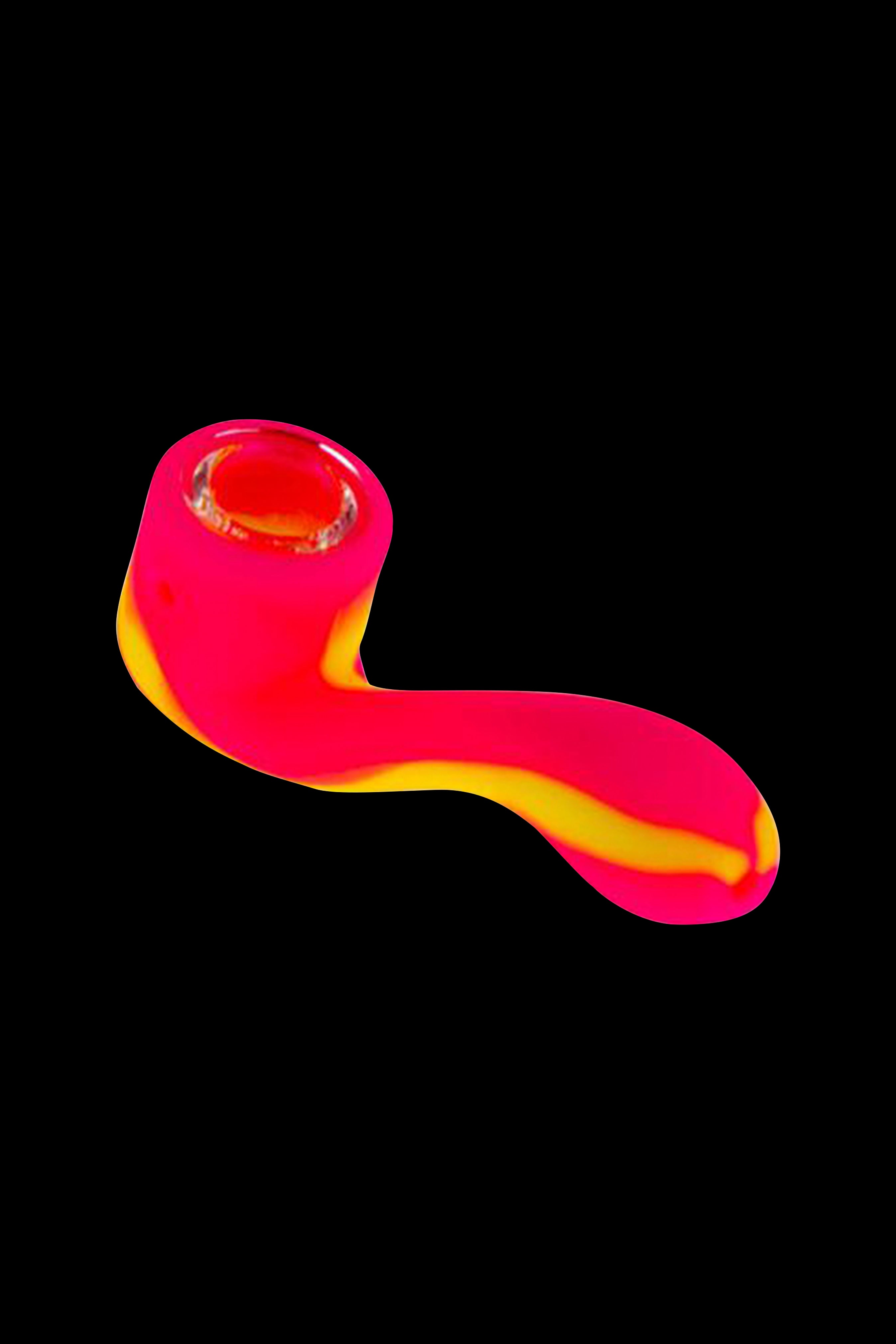 Neon pink glass pipe isolated on a black background.