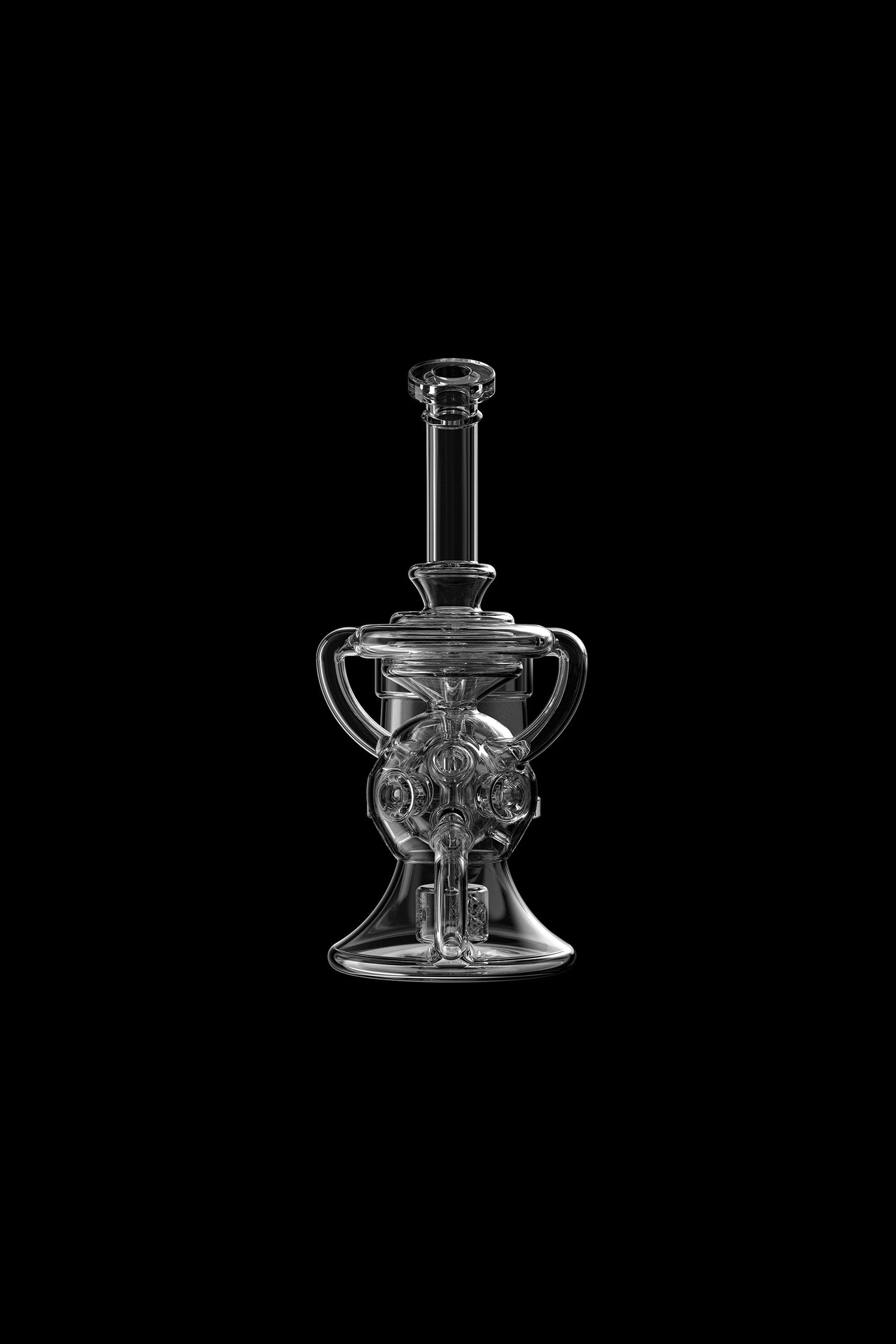 Clear glass rig with complex bubbler design, isolated on black.