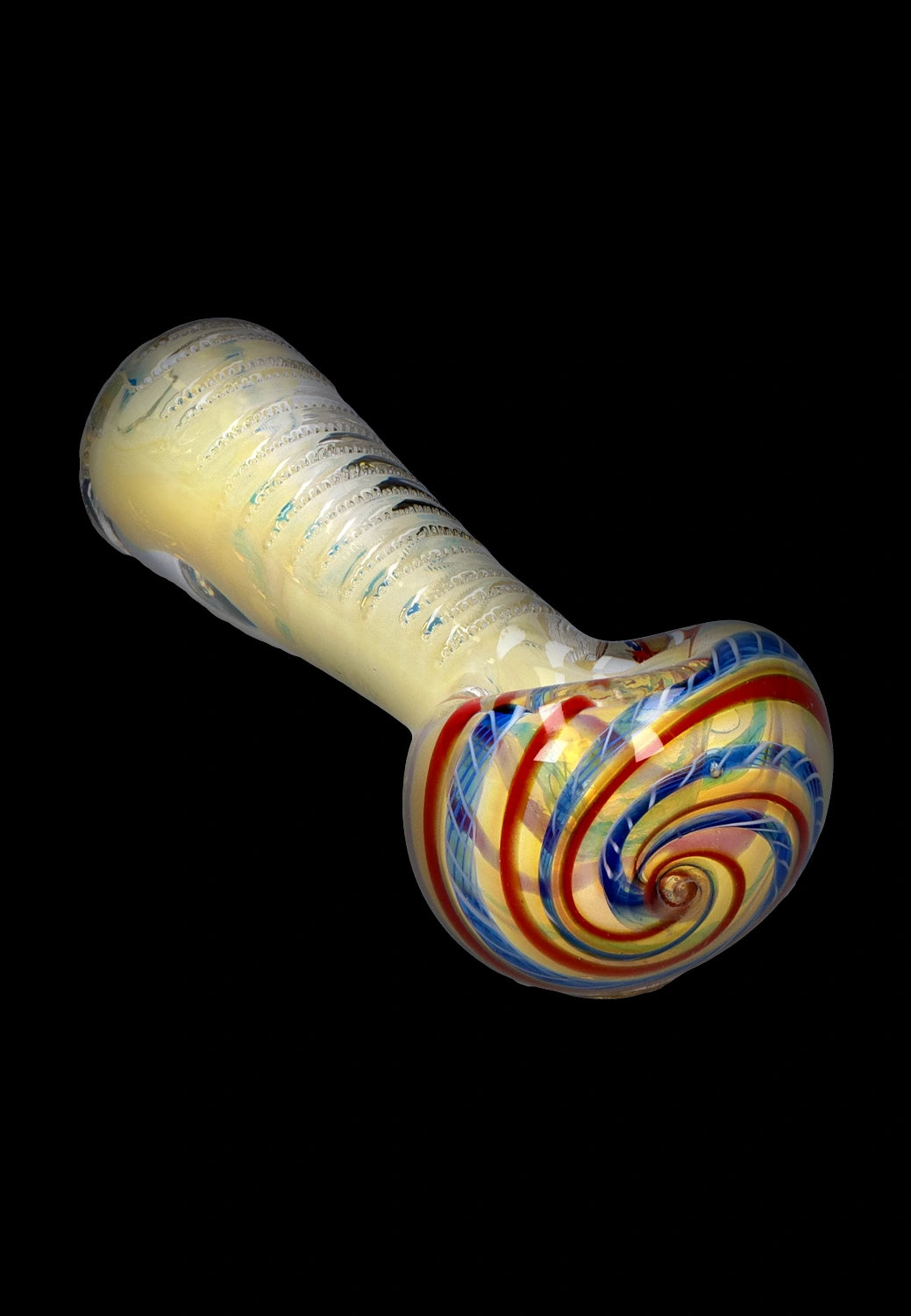 Angled close-up of the Smoke Cartel Engraved Fumed Spoon Pipe - 3 in., showing its pale fumed body with textured ridges and a colorful swirled bowl on a black background
