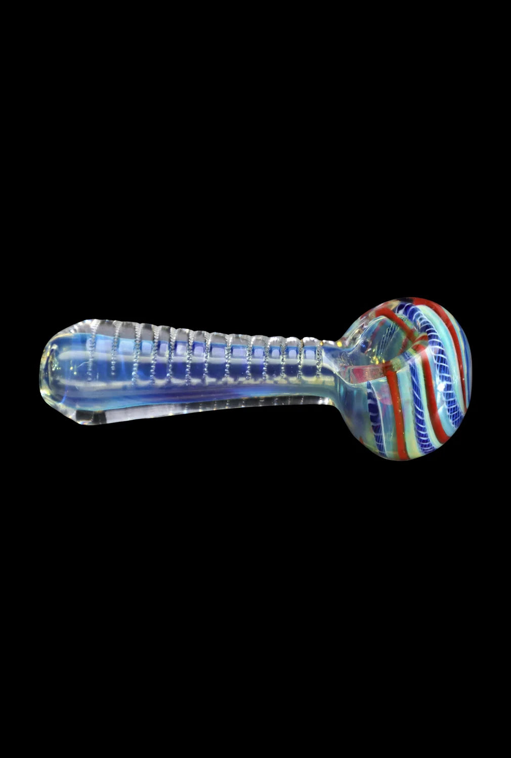 Side view of the Smoke Cartel Engraved Fumed Spoon Pipe - 3 in., showing a clear fumed glass body with ribbed engraving and a colorful striped bowl against a black background