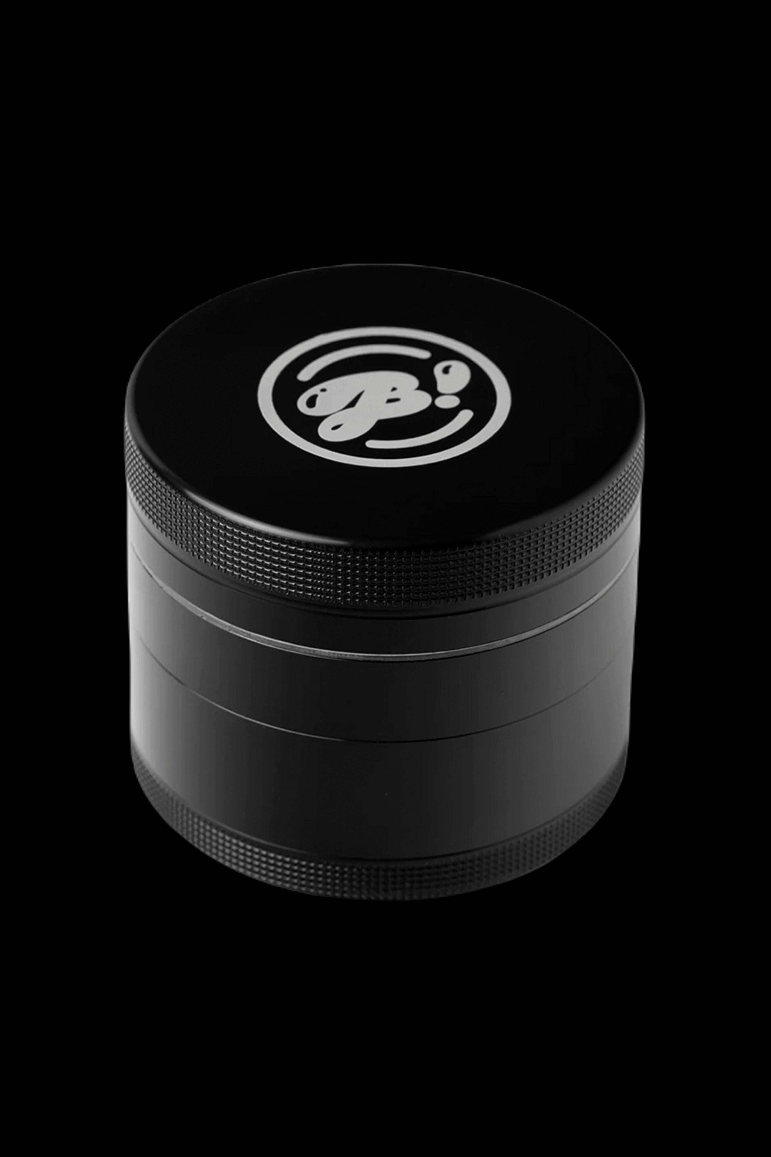 Black four-piece cannabis grinder with a white logo.