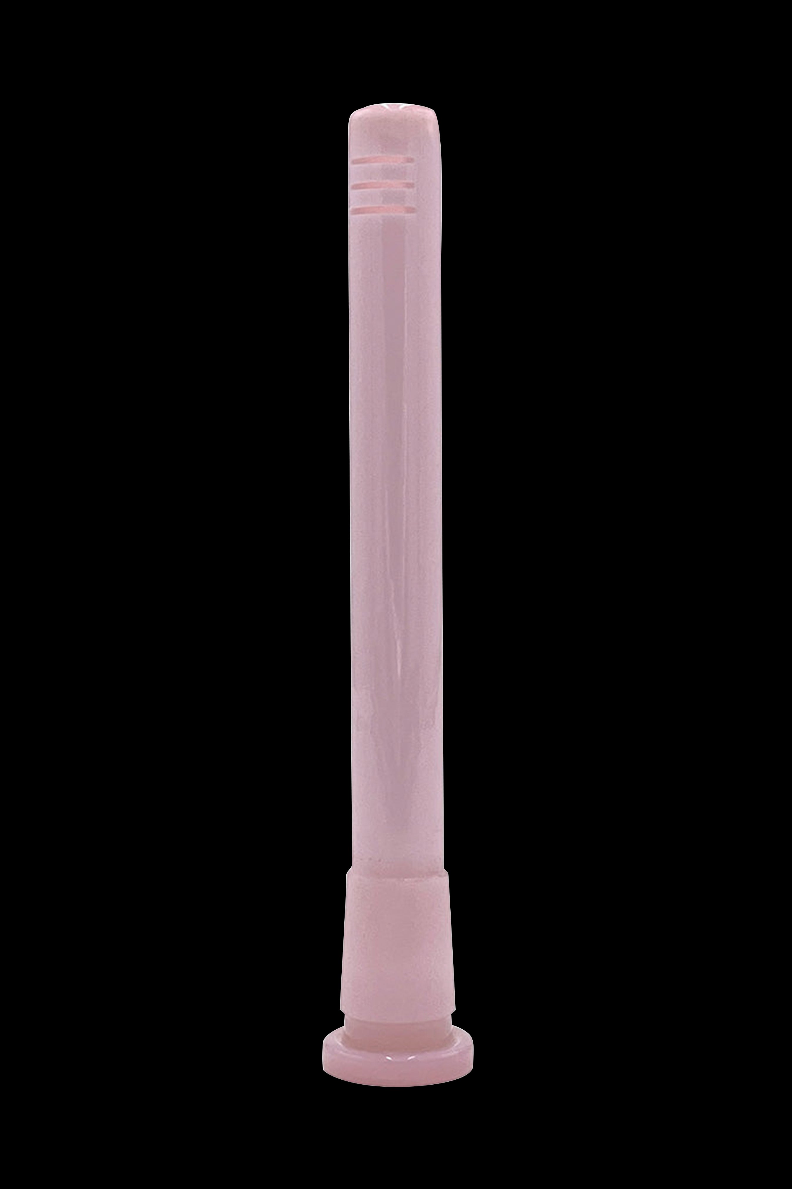 Pink glass pipe for smoking cannabis, isolated on a black background.