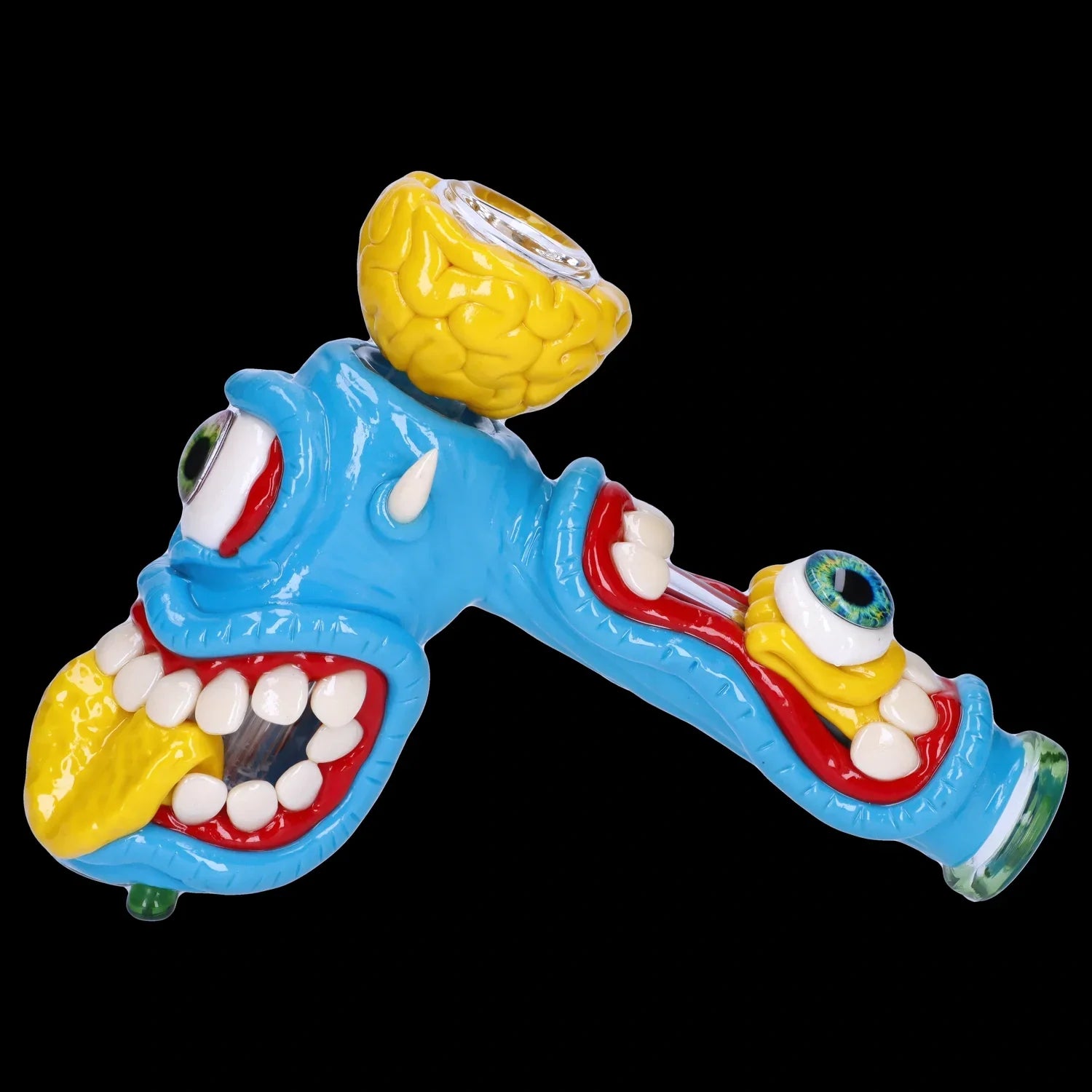 Front view of the Clay Monster Hammer Bubbler, a colorful glass piece shaped like a monster face with a wide, toothy grin.