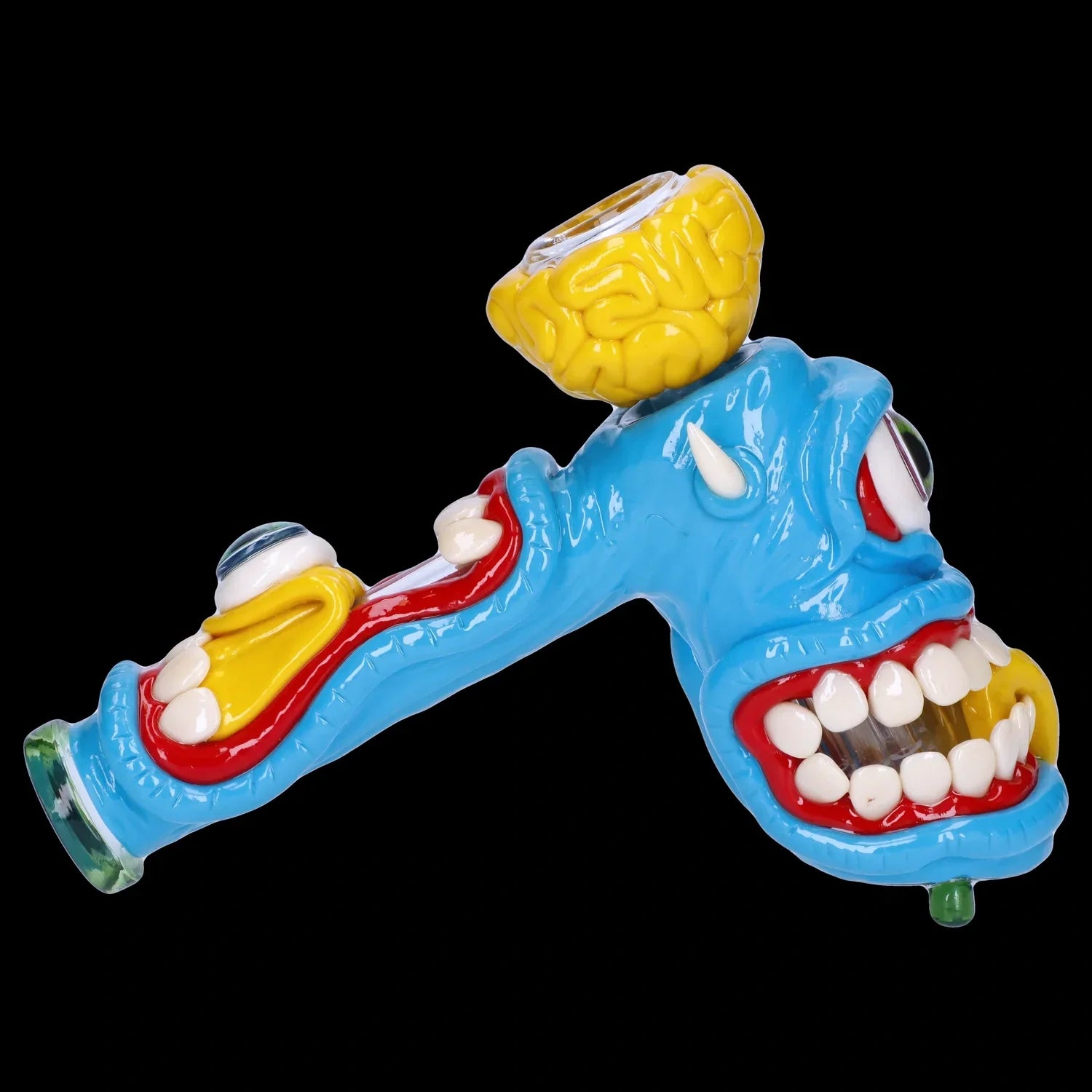 A side view of the Clay Monster Hammer Bubbler, showcasing its colorful, monster-themed glass design.