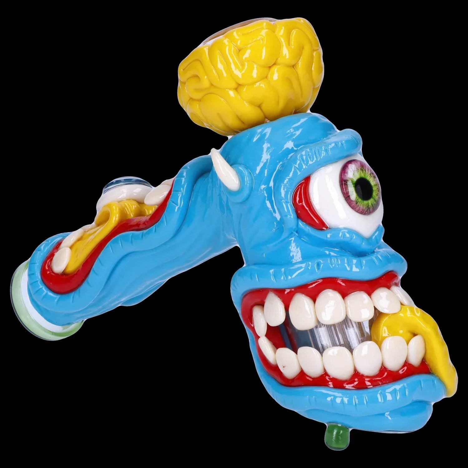 A side view of the Clay Monster Hammer Bubbler shows a colorful, sculpted glass piece with a unique, monster-inspired design.