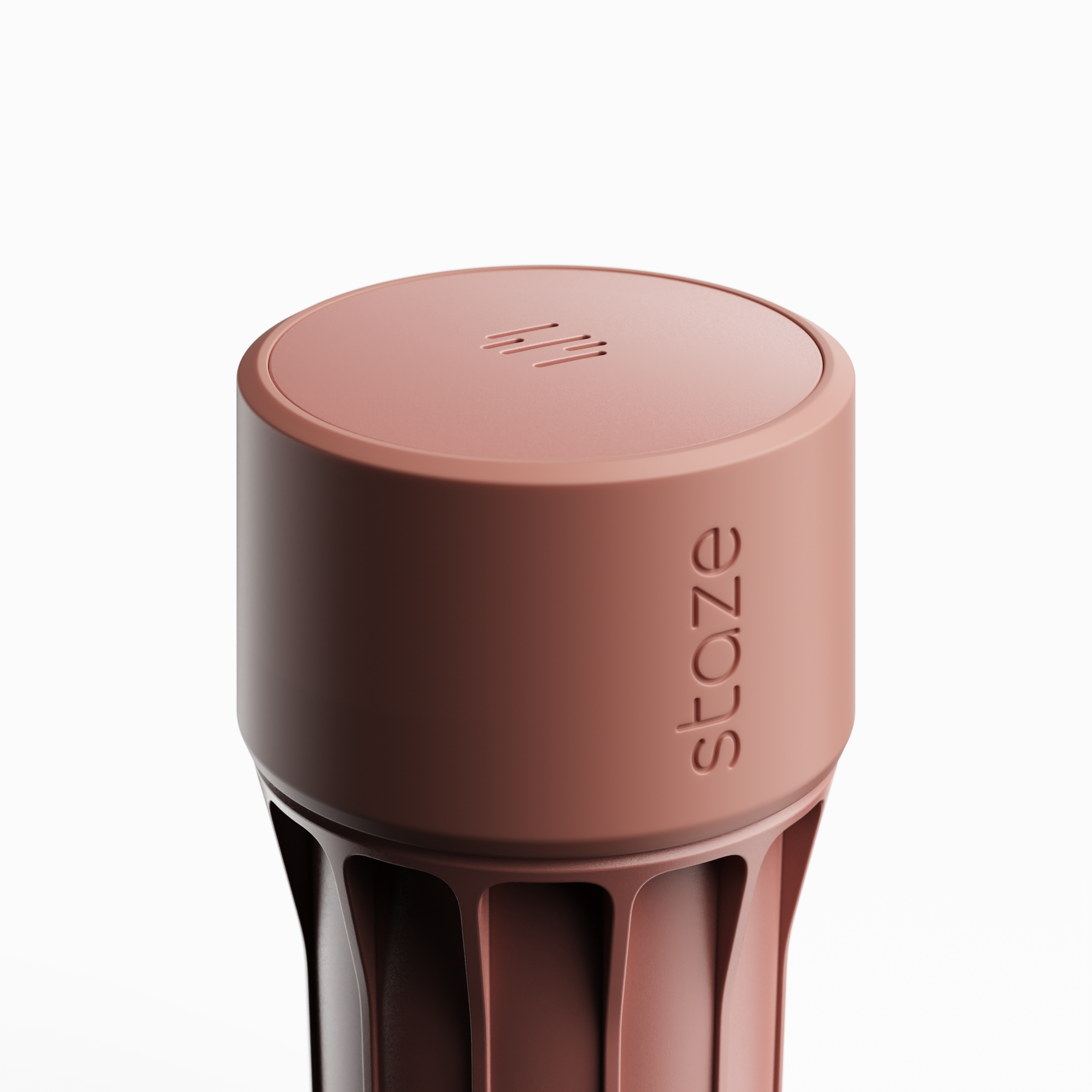 Close-up angled view of the rose-toned STAZE PRESERVE top and embossed side detailing.