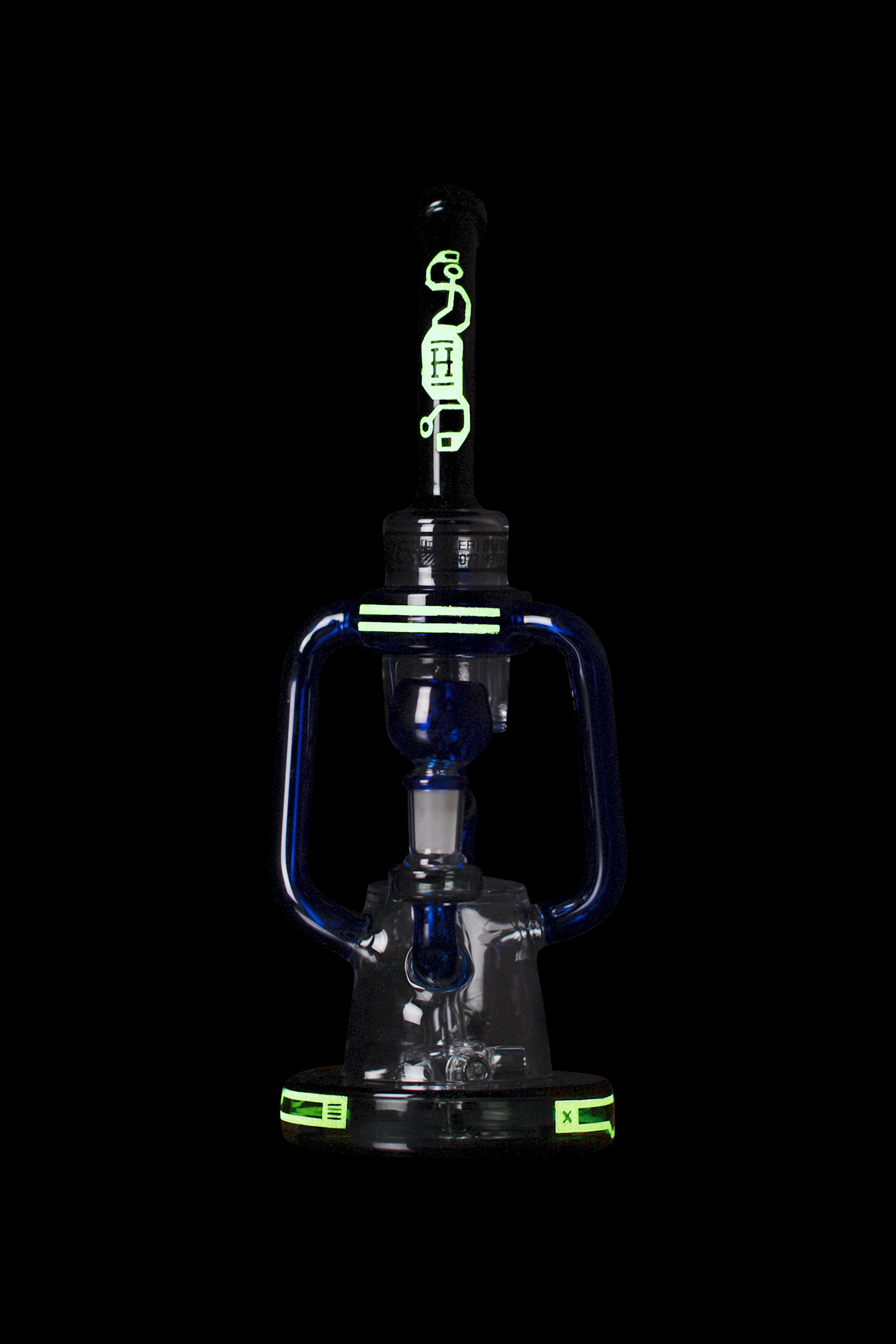 Blue glass water pipe with green accents, studio shot on black background.
