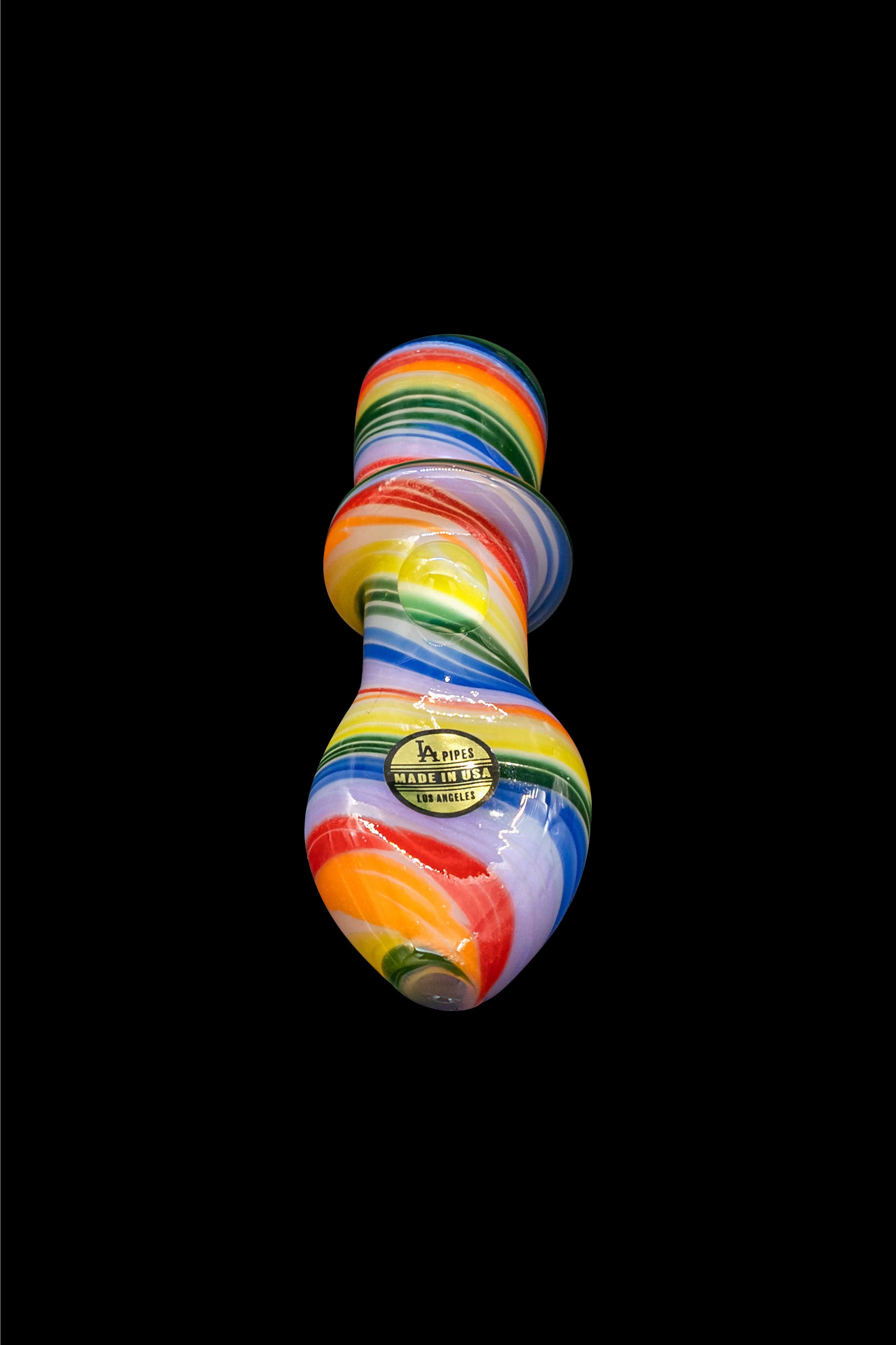 Colorful glass pipe with “JA Pipes – Made in USA” label against a black background.