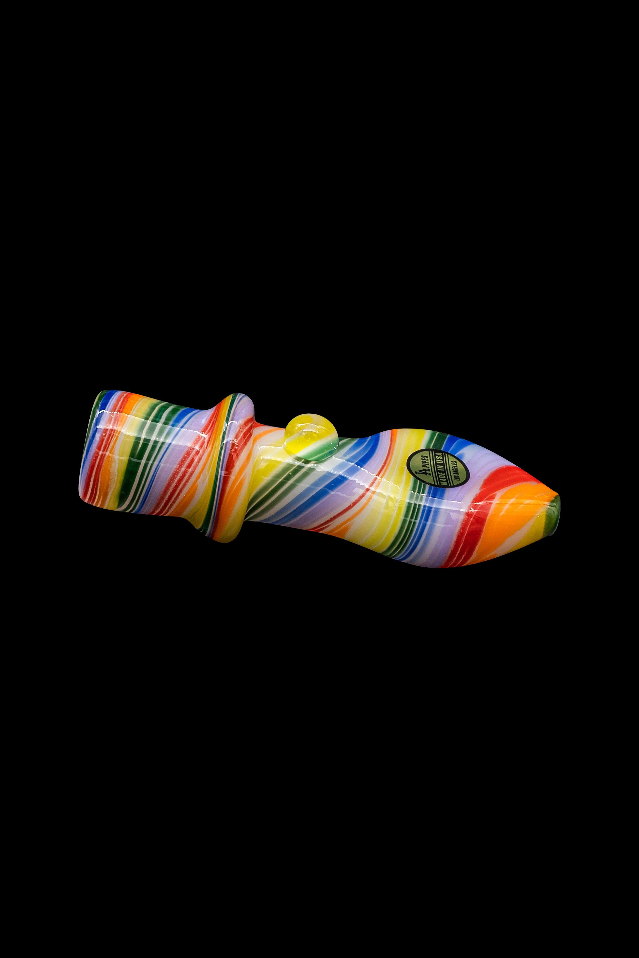 Colorful glass pipe against a black background.