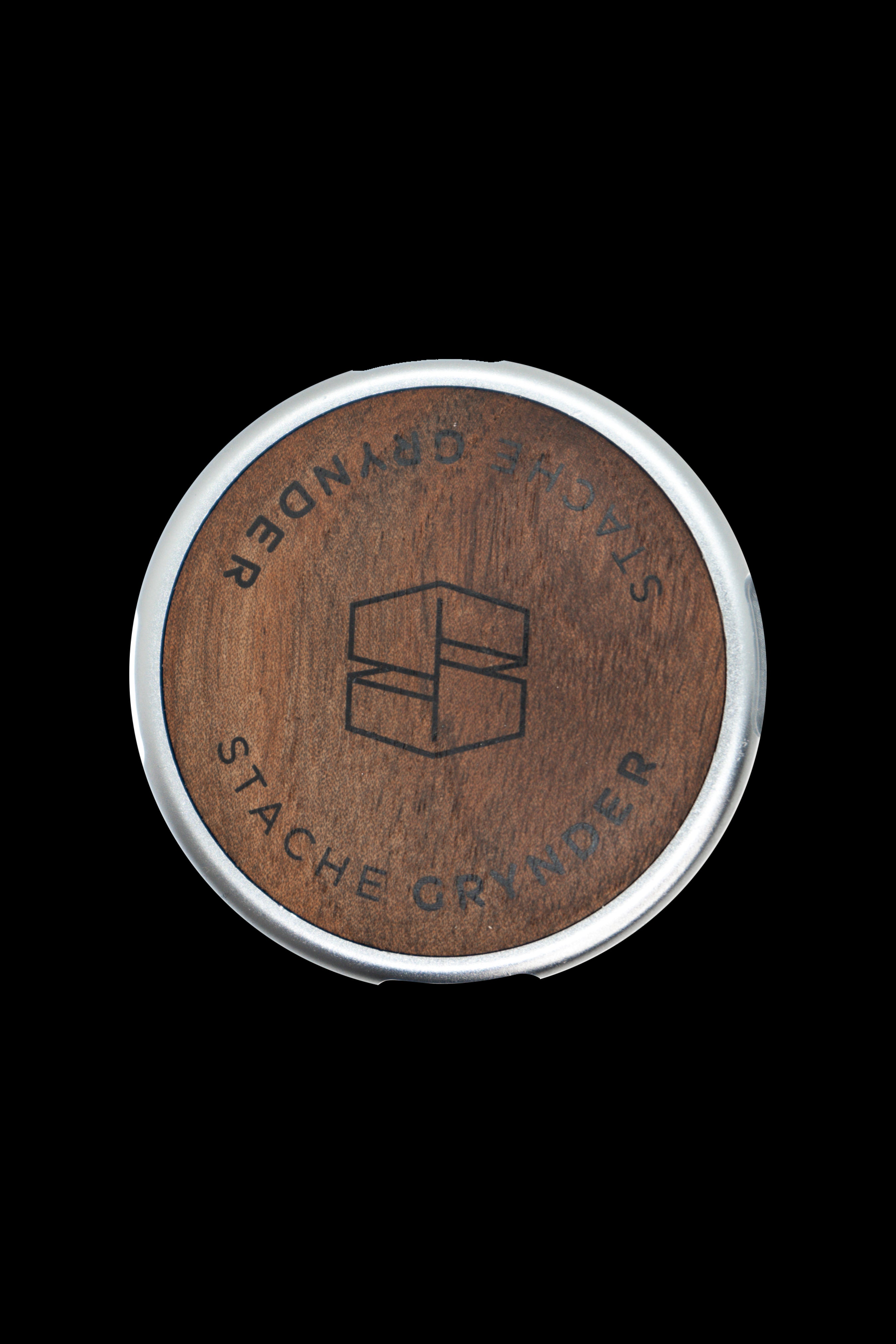 Wood and silver cannabis grinder with “Stache Grinder” engraved around a geometric logo.