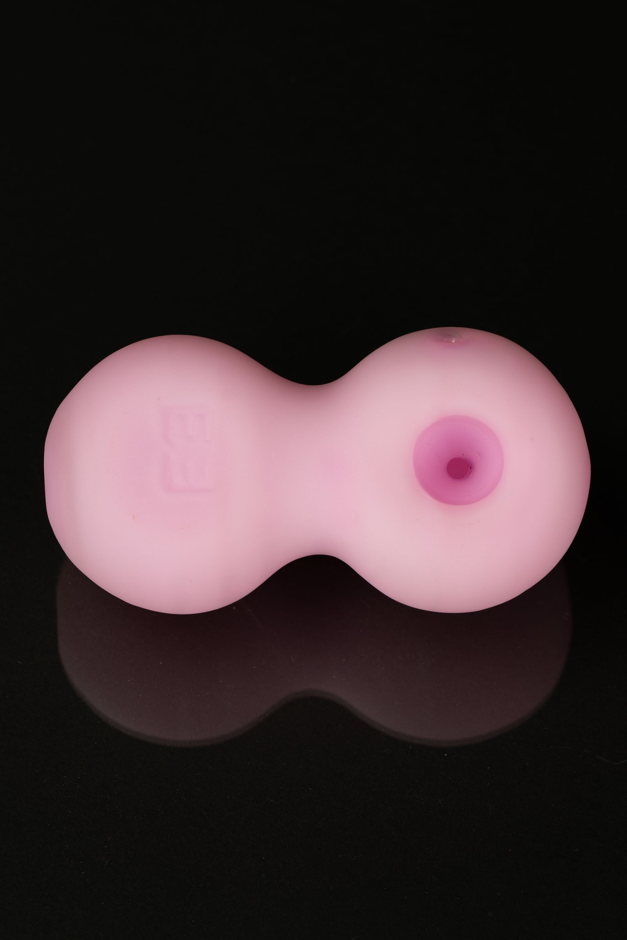 Pink double-bubbler glass pipe with a visible mouthpiece.